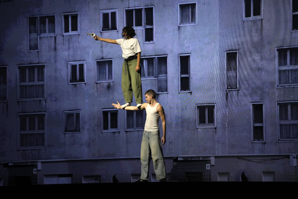 Actors perform during a rehearsal of La Haine musical show, in Tremblay en France, Tuesday, Sept. 17, 2024. (AP Photo/Christophe Ena)