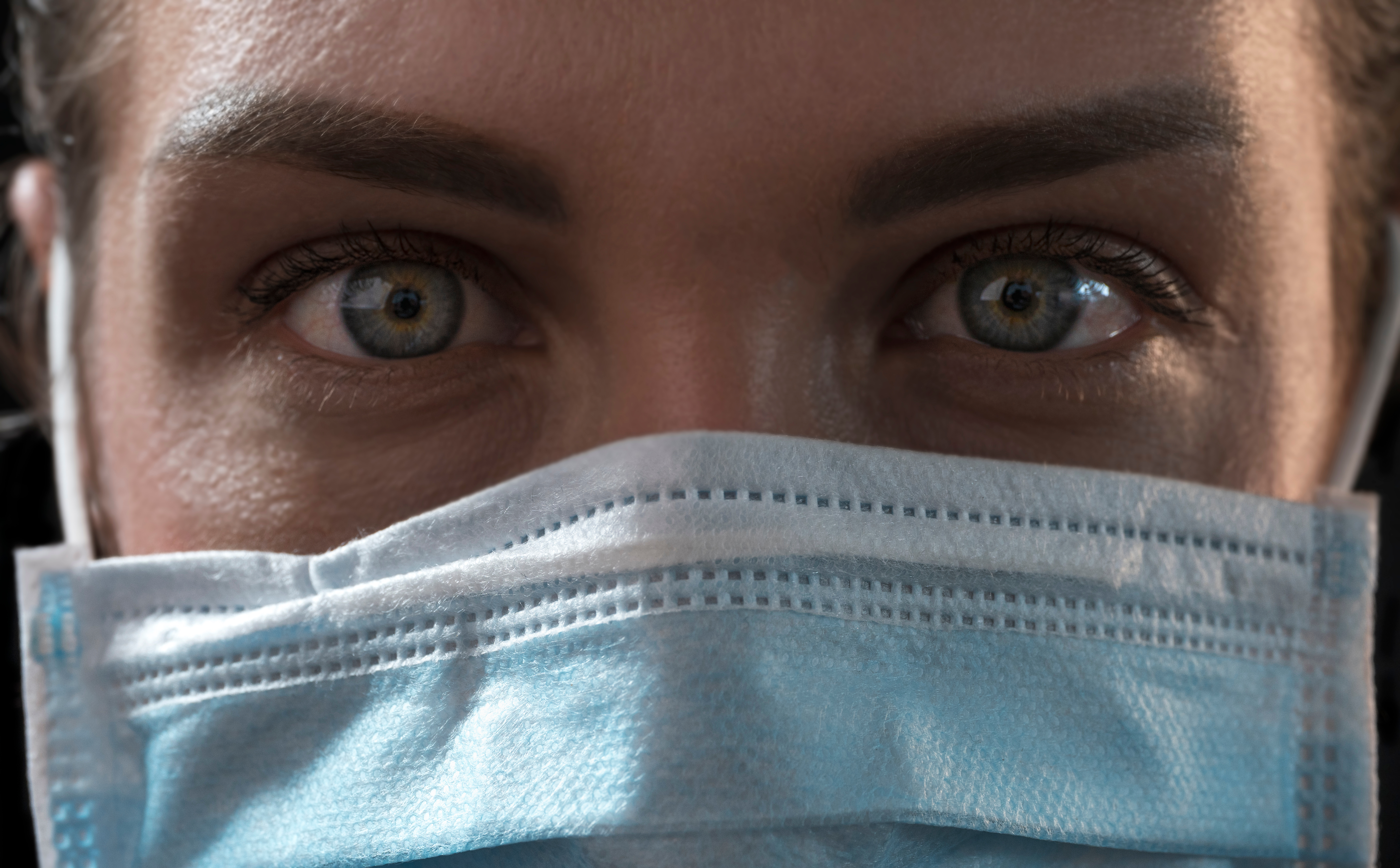 Beautiful,Caucasian,Infected,Girl,On,Black,Background,In,Medical,Mask