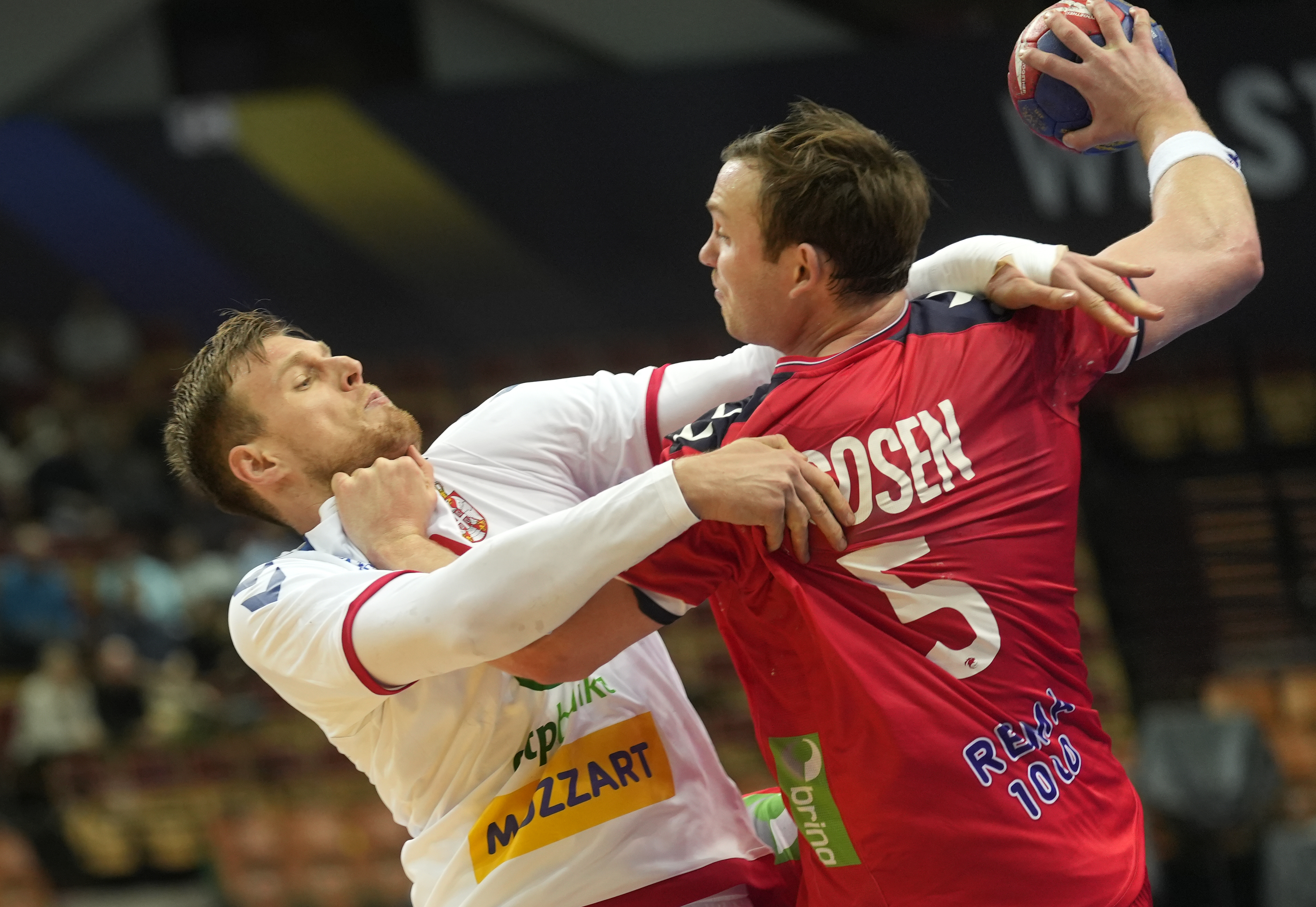 Norway's Sander Sagosen, right, in action against Serbia's Dragan Pechmalbec during the Main Round Group III, Handball World Championship match between Norway and Serbia in Katowice, Poland, Thursday, Jan. 19, 2023. (AP Photo/Piotr Hawalej)