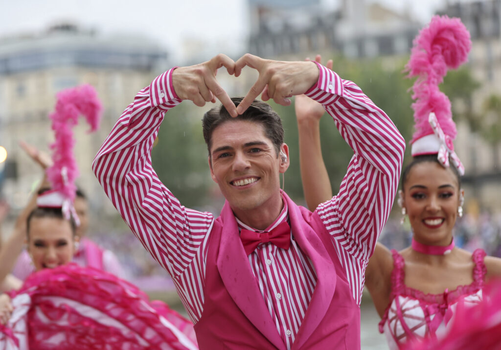 Actors perform during the opening ceremony of the 2024 Summer Olympics, Friday, July 26, 2024 in Paris, France. (Wang Dongzhen/Pool Photo via AP)