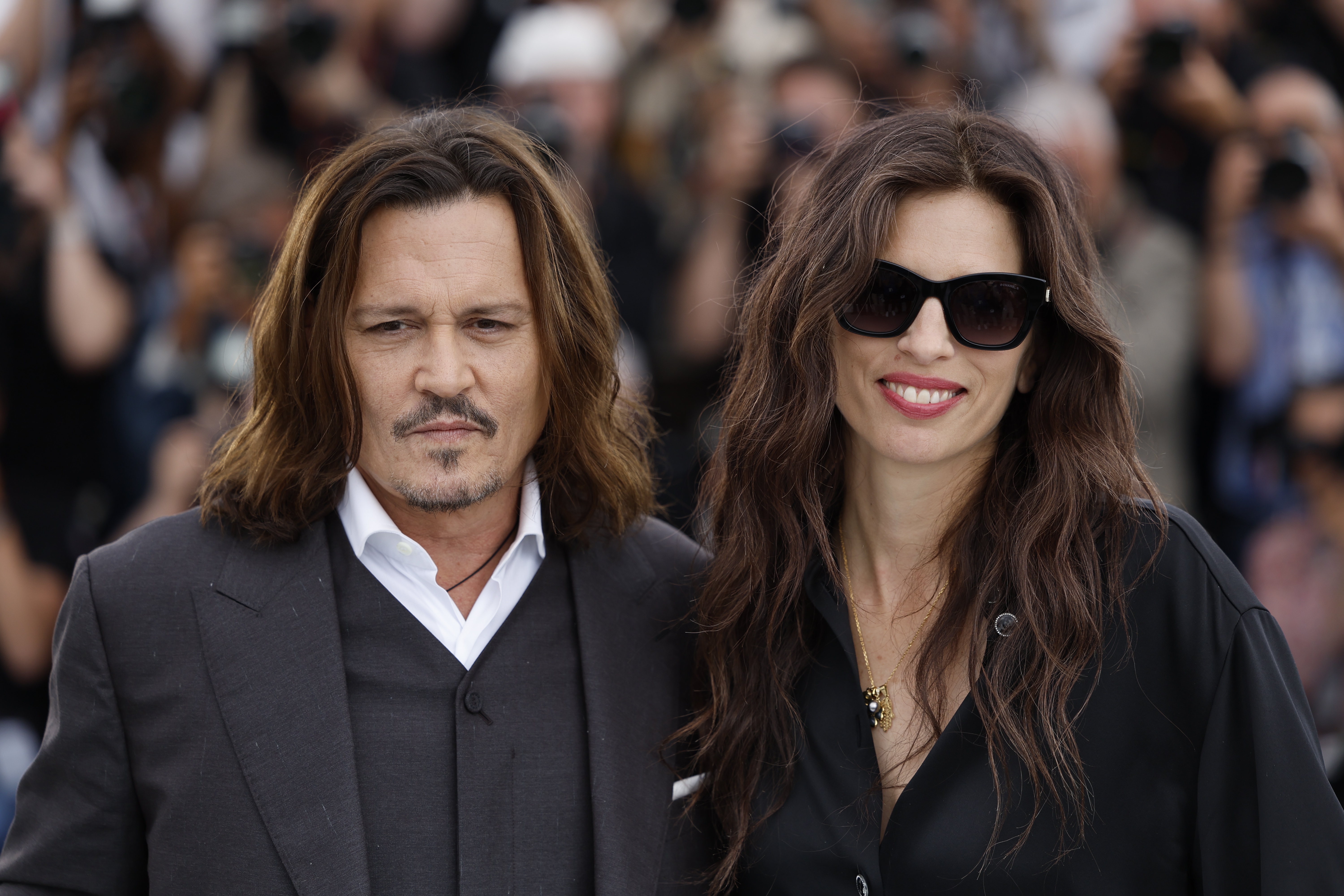 epa10633626 US actor Johnny Depp (L) and French actor/director Maiwenn attend the photocall for 'Jeanne du Barry' during the 76th annual Cannes Film Festival, in Cannes, France, 17 May 2023. The festival runs from 16 to 27 May.  EPA-EFE/SEBASTIEN NOGIER