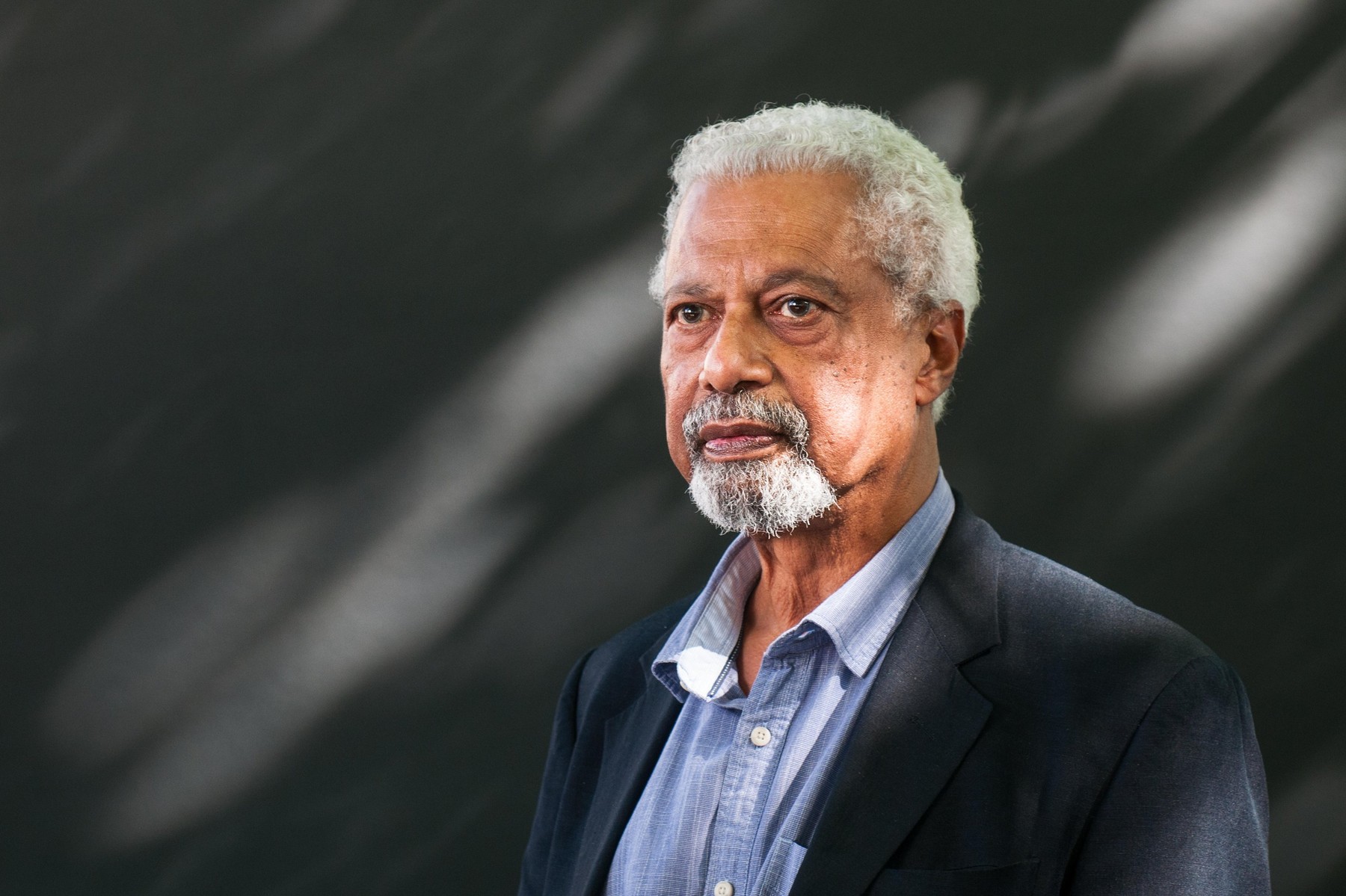 Tanzanian novelist Abdulrazak Gurnah attends a photocall during the Edinburgh International Book Festival on August 12, 2017 in Edinburgh, Scotland.