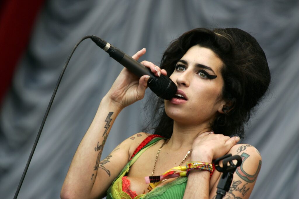 Amy Winehouse performing on the Pyramid Stage
Glastonbury Festival, Britain - 22 Jun 2007,Image: 225829884, License: Rights-managed, Restrictions: , Model Release: no, Credit line: Leon Schadeberg / Shutterstock Editorial / Profimedia