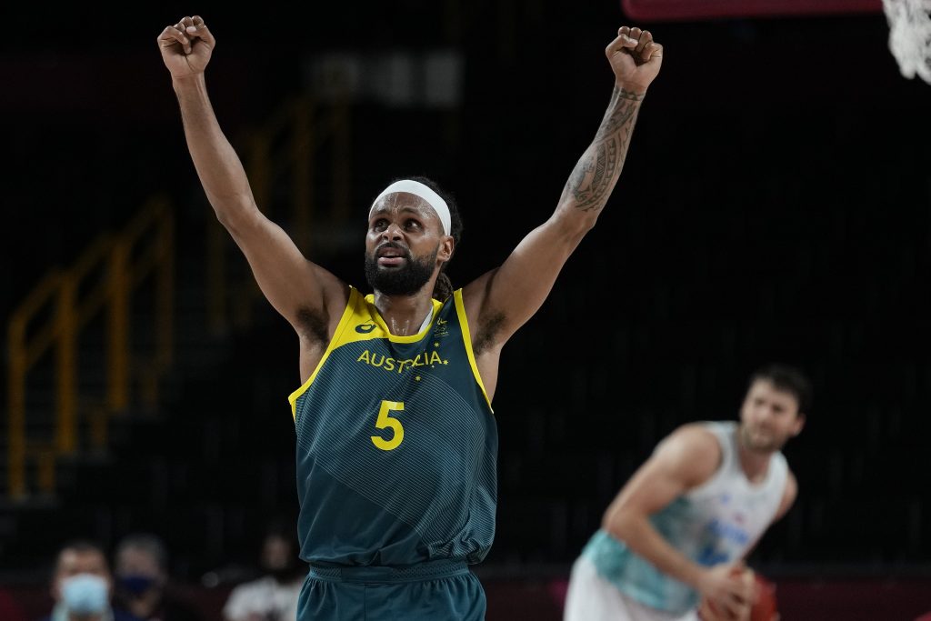 Australia's Patty Mills (5) reacts as time runs down against Slovenia during the men's bronze medal basketball game at the 2020 Summer Olympics, Saturday, Aug. 7, 2021, in Tokyo, Japan. (AP Photo/Eric Gay)