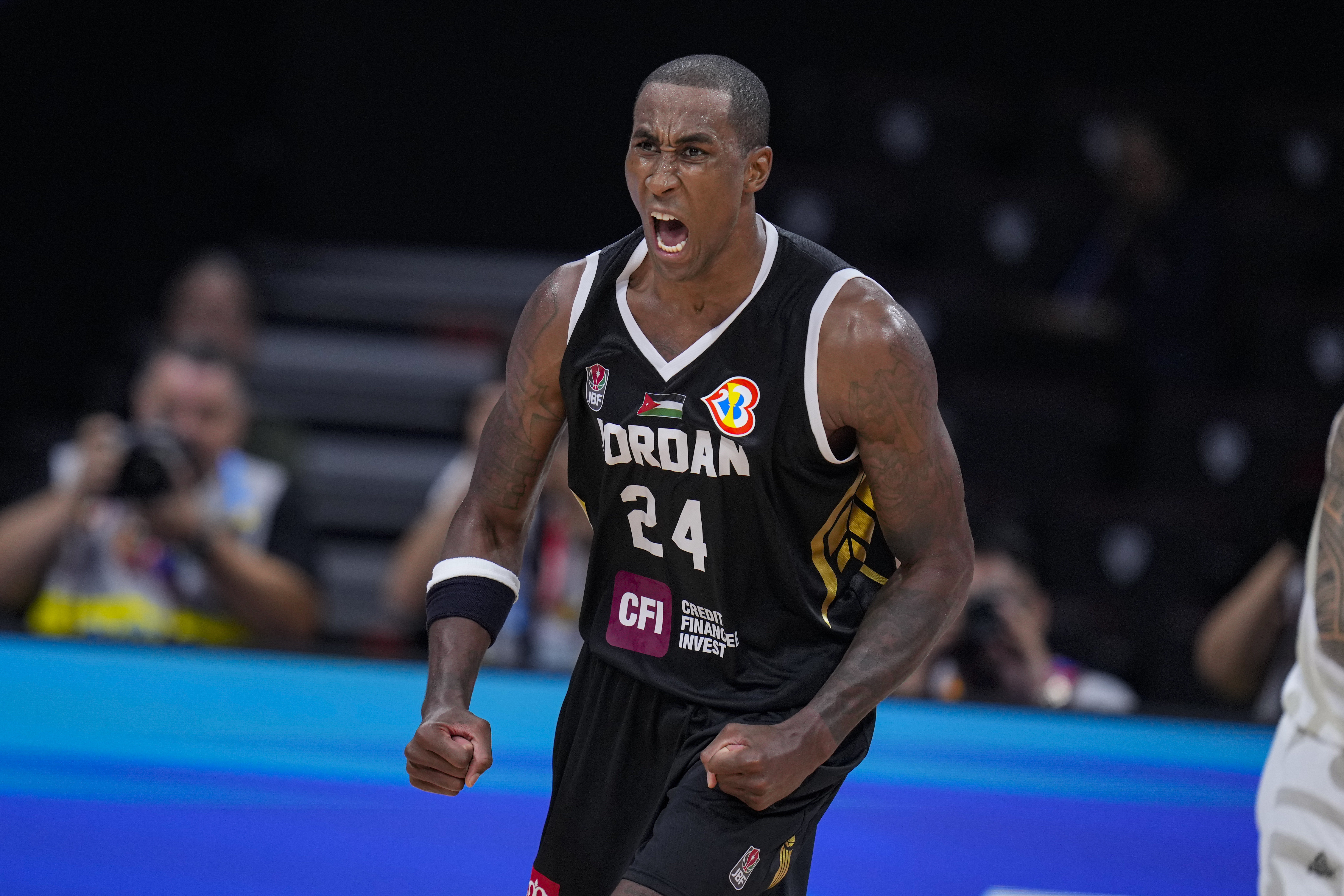 Jordan forward Rondae Hollis Jefferson (24) celebrates after a basket against New Zealand during the second half of a Basketball World Cup group C match in Manila, Philippines Monday, Aug. 28, 2023. (AP Photo/Michael Conroy)
