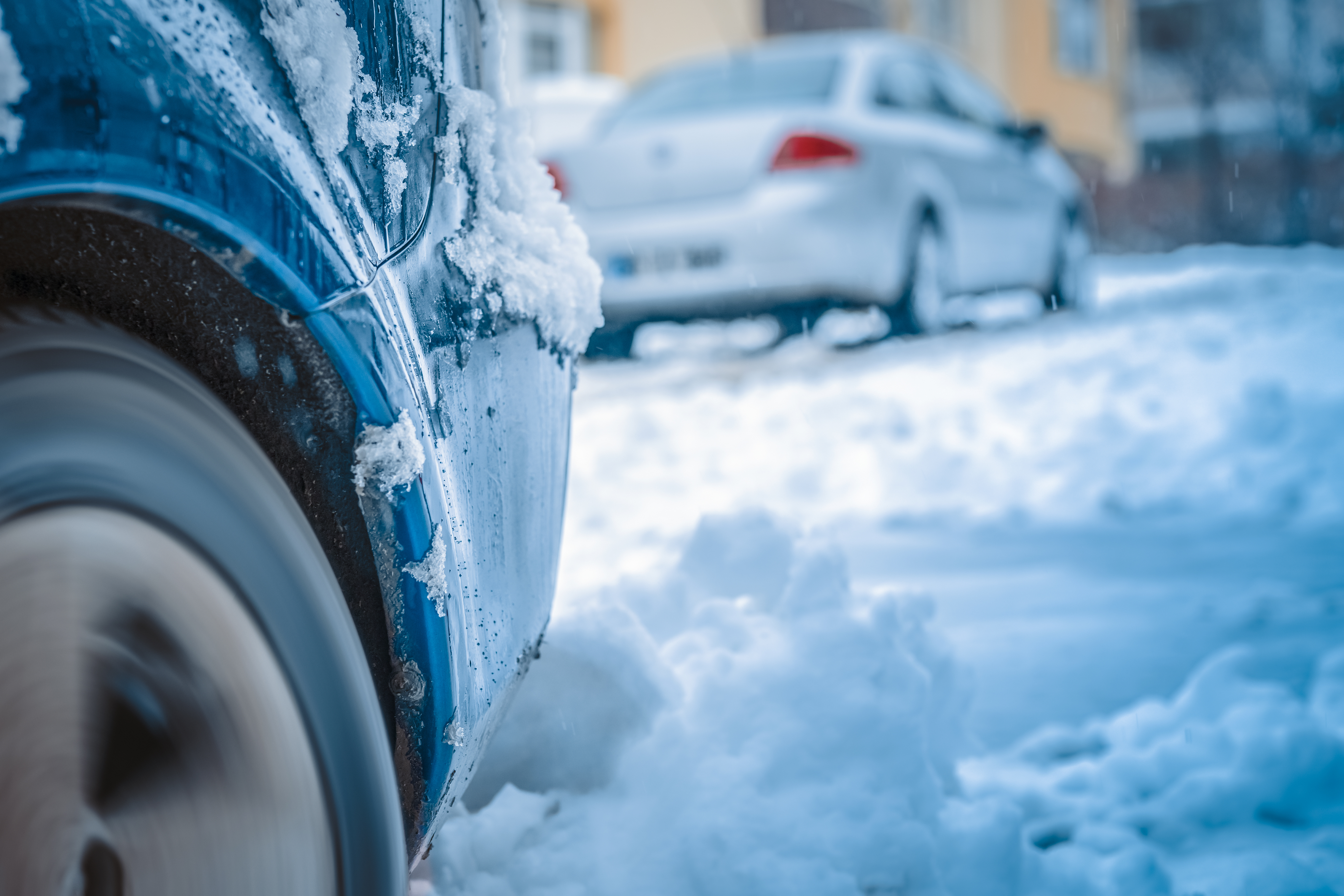 Closeup,Wheel,Spinning,Car,Trying,To,Move,In,Snow