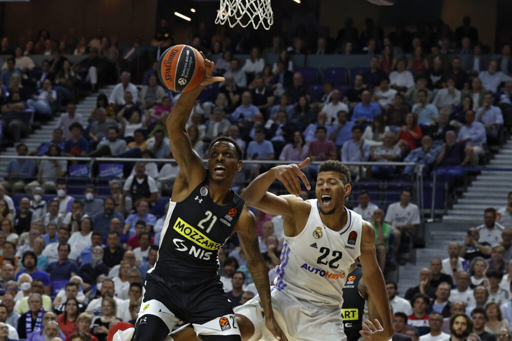 epa10619829 Real Madrid's Edy Tavares (R) and James Nunnally of Partizan in action during the fifth game of the EuroLeague playoffs between Real Madrid and Partizan Belgrade in Madrid, Spain, 20 May 2023.  EPA-EFE/Juanjo Martin