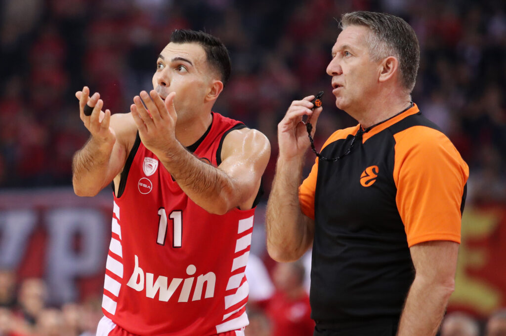Kostas Slouakas (L) and referee sudija Sreten Radovic during the Turkish Airlines EuroLeague match between Olympiacos and Partizan Mozzart Bet Belgrade at Peace And Friendship Stadium on November 10, 2022 in Athens, Greece. (Photo by Starsport.rs ©)