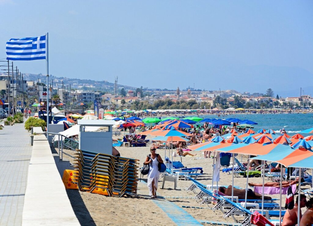 Tourists relaxing on the sandy beach, Perivolia, Crete, Greece, Europe.,Image: 318130138, License: Rights-managed, Restrictions: , Model Release: no, Credit line: a-plus image bank / Alamy / Alamy / Profimedia