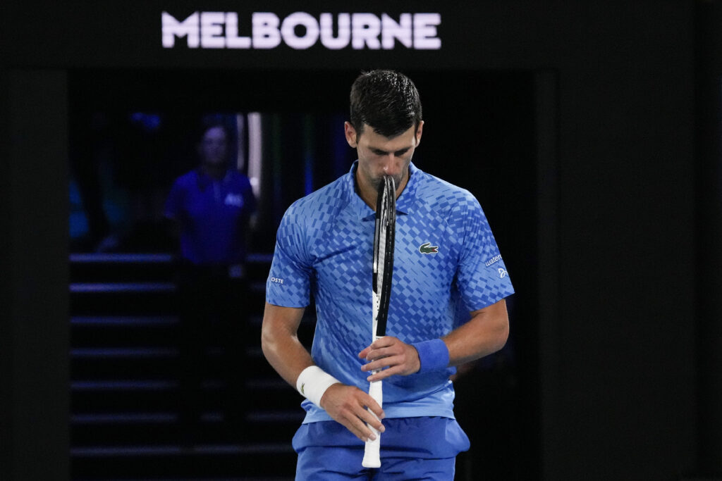 Novak Djokovic of Serbia reacts during his first round match against Roberto Carballes Baena of Spain at the Australian Open tennis championship in Melbourne, Australia, Wednesday, Jan. 18, 2023. (AP Photo/Aaron Favila)