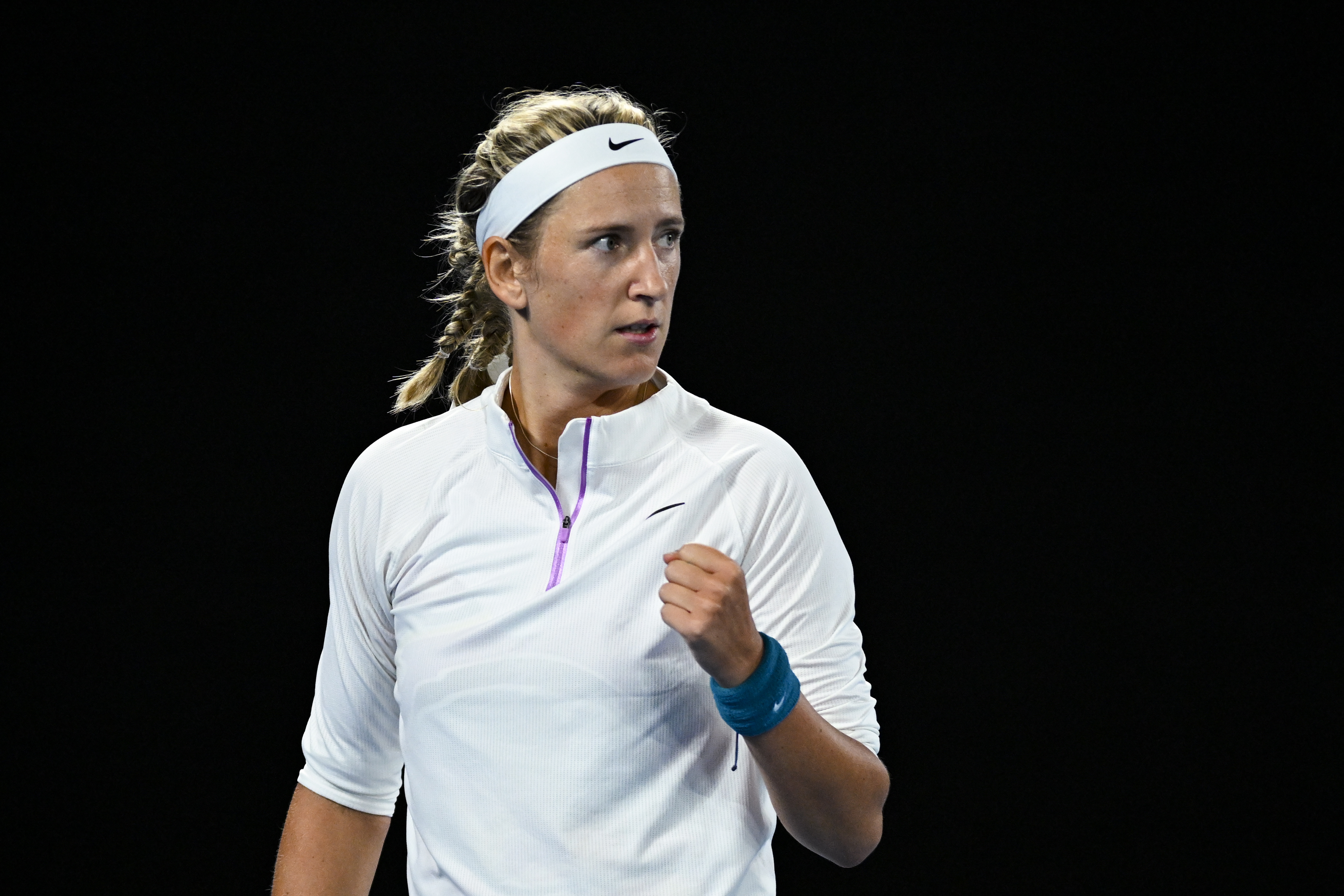 epa10422993 Victoria Azarenka of Belarus reacts during her 4th round match against Lin Zhu of China at the 2023 Australian Open tennis tournament in Melbourne, Australia, 23 January 2023.  EPA-EFE/LUKAS COCH  AUSTRALIA AND NEW ZEALAND OUT
