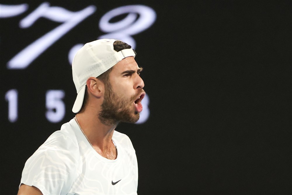 epa10425986 Karen Khachanov of Russia reacts after a point against Sebastian Korda of the USA during their quarterfinal match at the Australian Open tennis tournament in Melbourne, Australia, 24 January 2023.  EPA-EFE/FAZRY ISMAIL