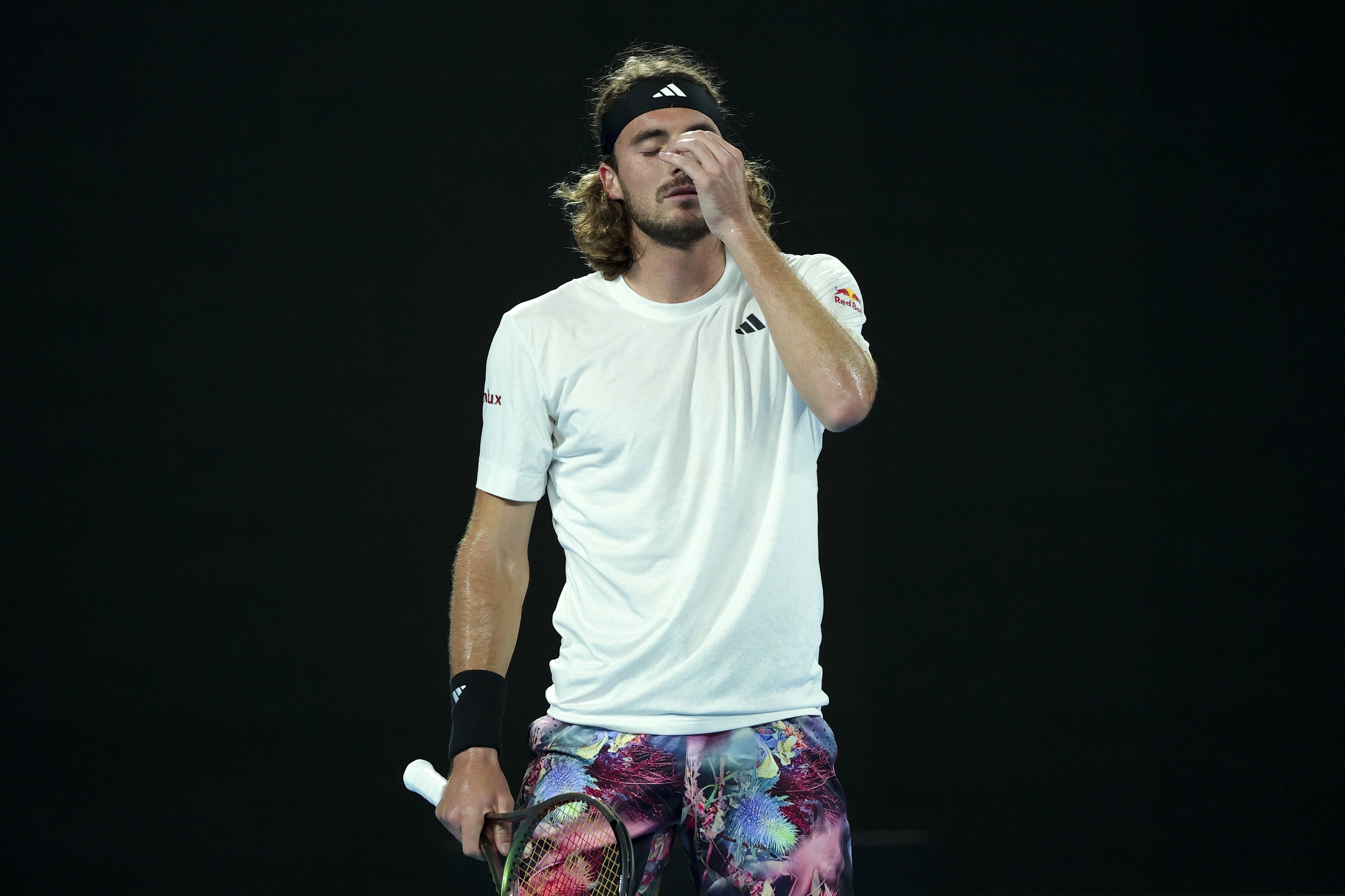 epa10426373 Stefanos Tsitsipas of Greece reacts in his quarter final match against Jiri Lehecka of the Czech Republic at the Australian Open tennis tournament in Melbourne, Australia 24 January 2023.  EPA-EFE/FAZRY ISMAIL