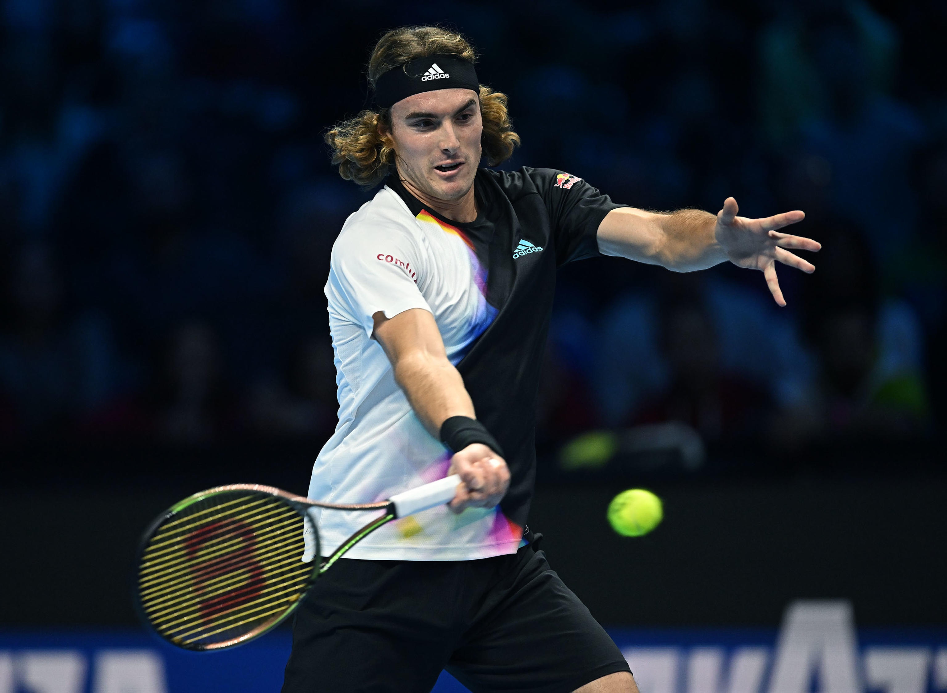 epa10305996 Stefanos Tsitsipas of Greece in action against Novak Djokovic of Serbia during their group match of the Nitto ATP Finals 2022 tennis tournament at the Pala Alpitour arena in Turin, Italy, 14 November 2022.  EPA-EFE/Alessandro Di Marco