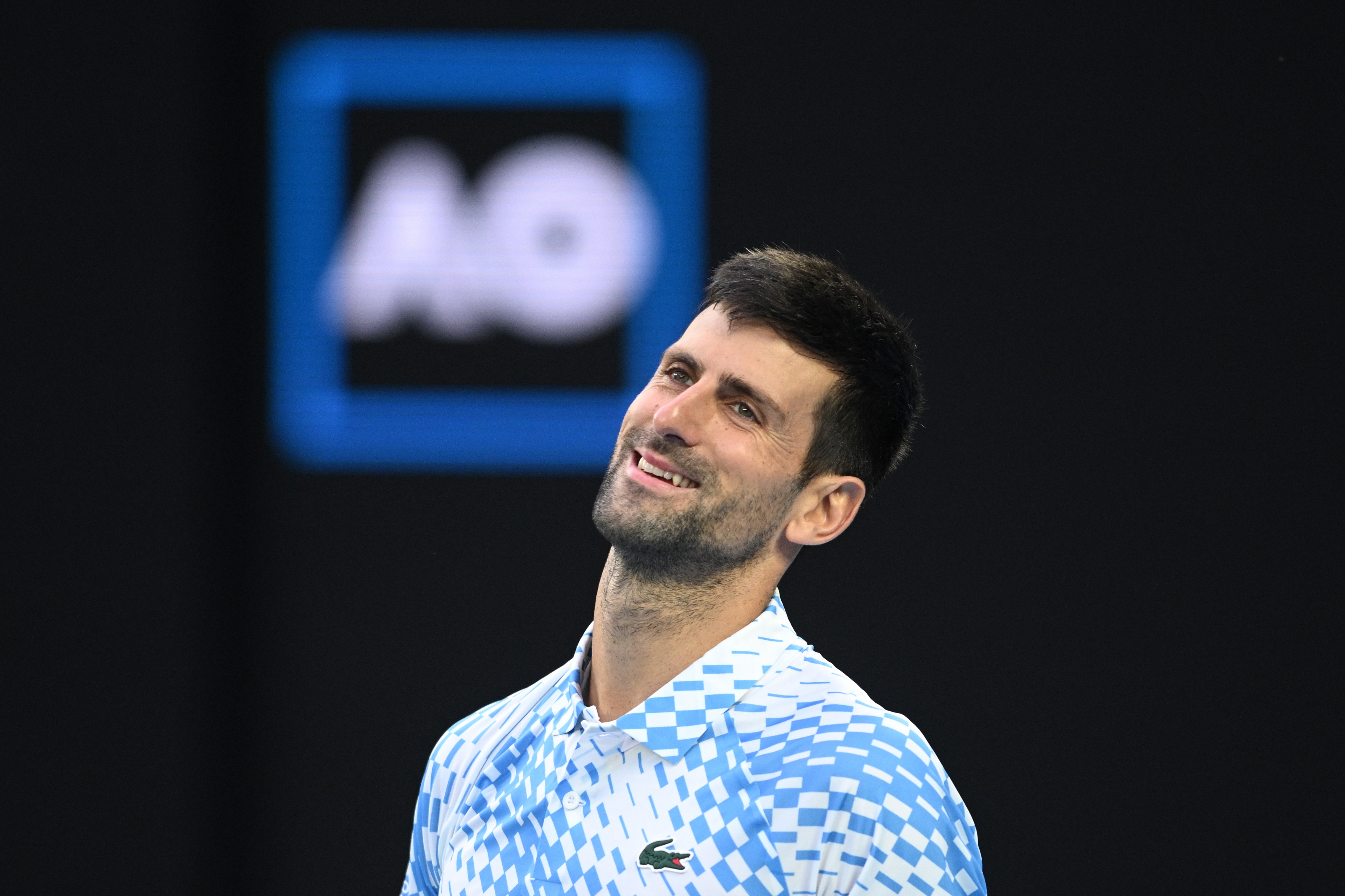 epa10428123 Novak Djokovic of Serbia reacts during his quarterfinal match against Andrey Rublev of Russia at the 2023 Australian Open tennis tournament in Melbourne, Australia, 25 January 2023.  EPA-EFE/JAMES ROSS AUSTRALIA AND NEW ZEALAND OUT