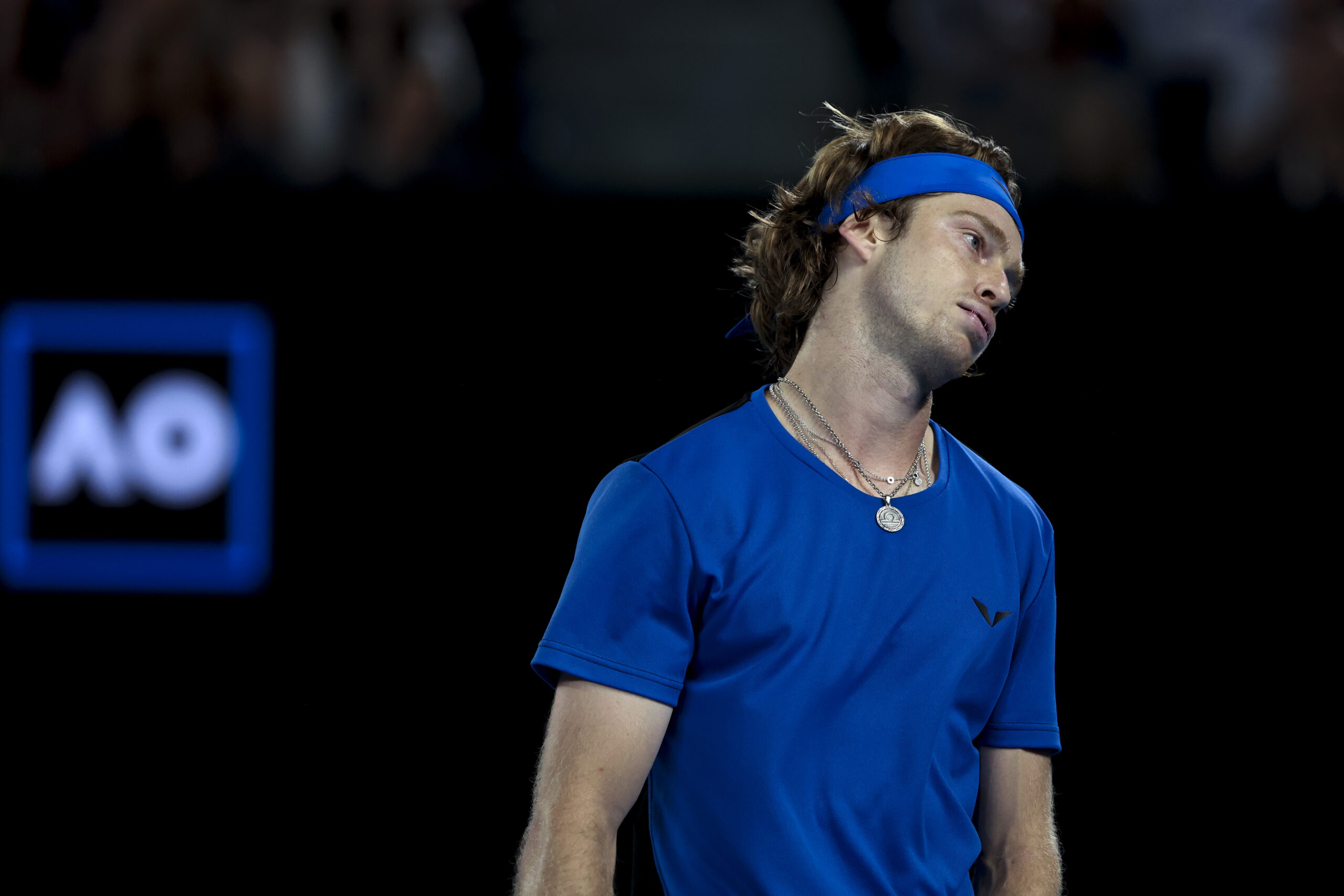 epa10428379 Andrey Rublev of Russia reacts during his quarter final match against Novak Djokovic of Serbia at the Australian Open tennis tournament in Melbourne, Australia, 25 January 2023.  EPA-EFE/FAZRY ISMAIL