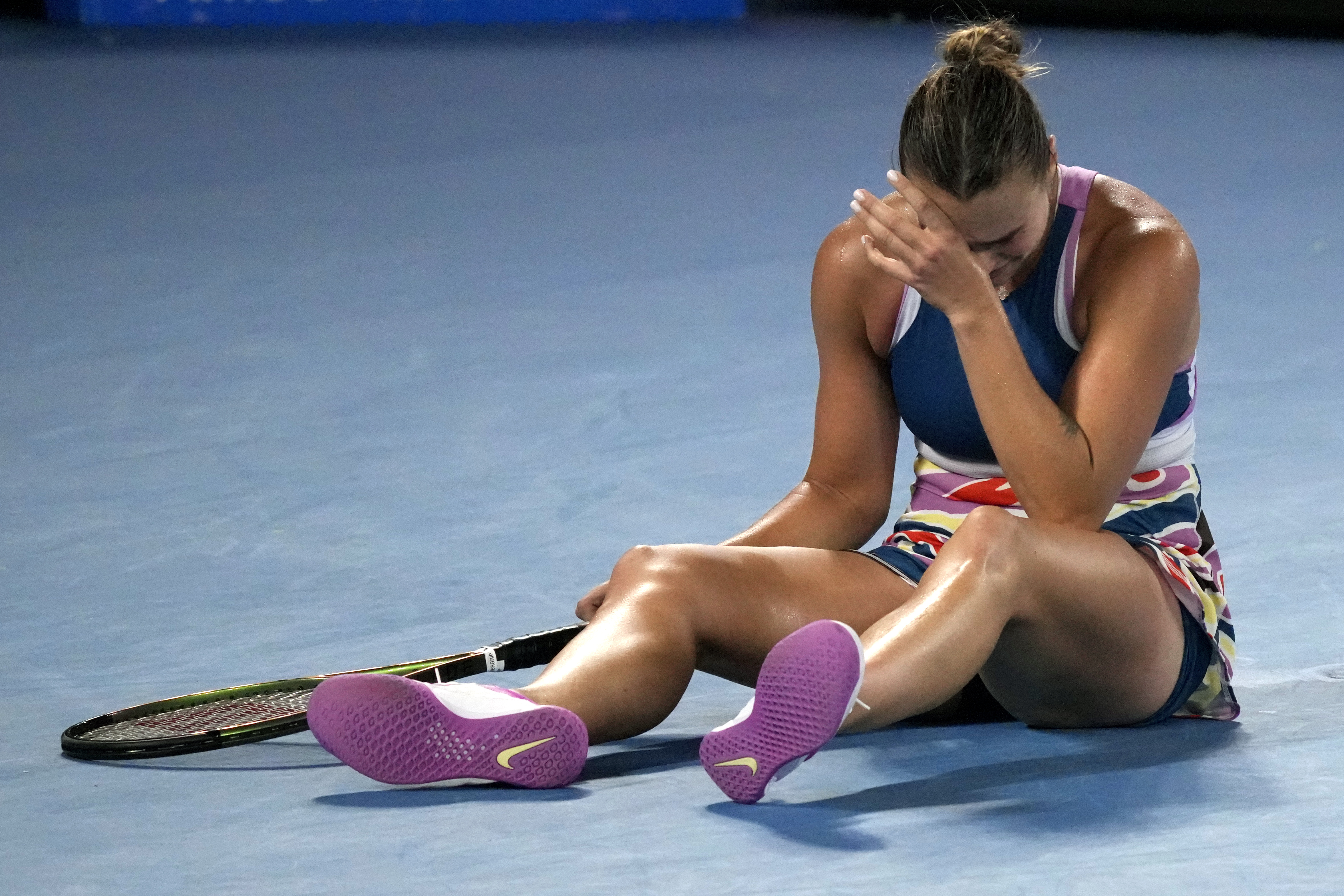 Aryna Sabalenka of Belarus celebrates after defeating Elena Rybakina of Kazakhstan in the women's singles final at the Australian Open tennis championship in Melbourne, Australia, Saturday, Jan. 28, 2023. (AP Photo/Dita Alangkara)