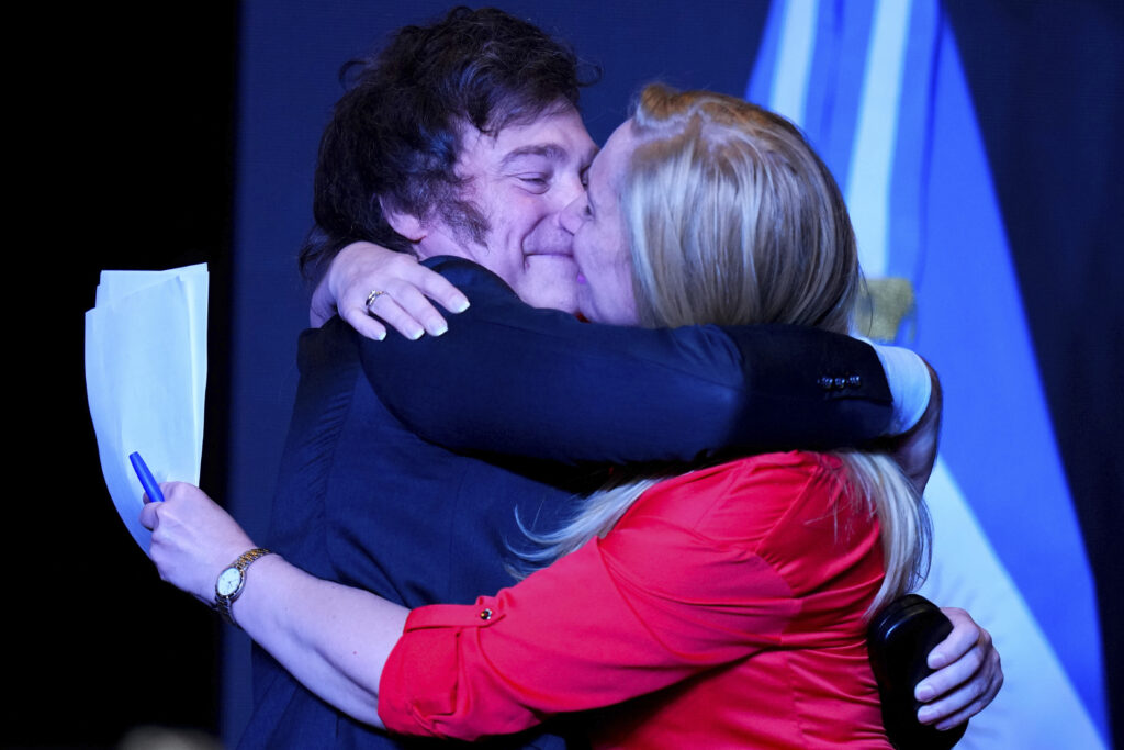 Javier Milei, presidential candidate of the Liberty Advances coalition, embraces his sister Karina Milei after being elected president in a runoff election in Buenos Aires, Argentina, Sunday, Nov. 19, 2023. (AP Photo/Natacha Pisarenko)