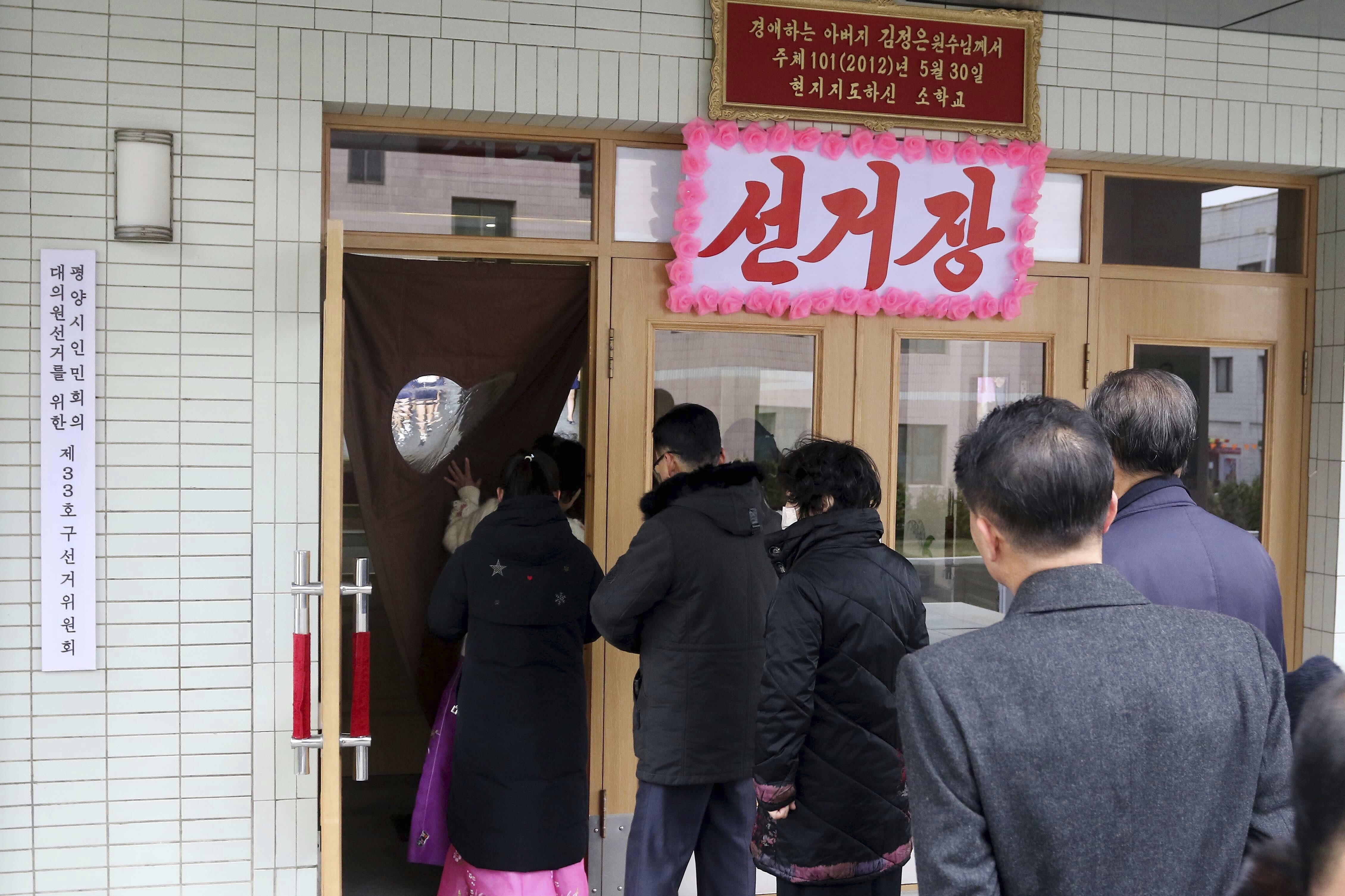 North Koreans line up to vote during the election at a polling station in the central district of Pyongyang, North Korea, Sunday, Nov. 26, 2023. North Korea held elections for local government representatives.(AP Photo/Jon Chol Jin)