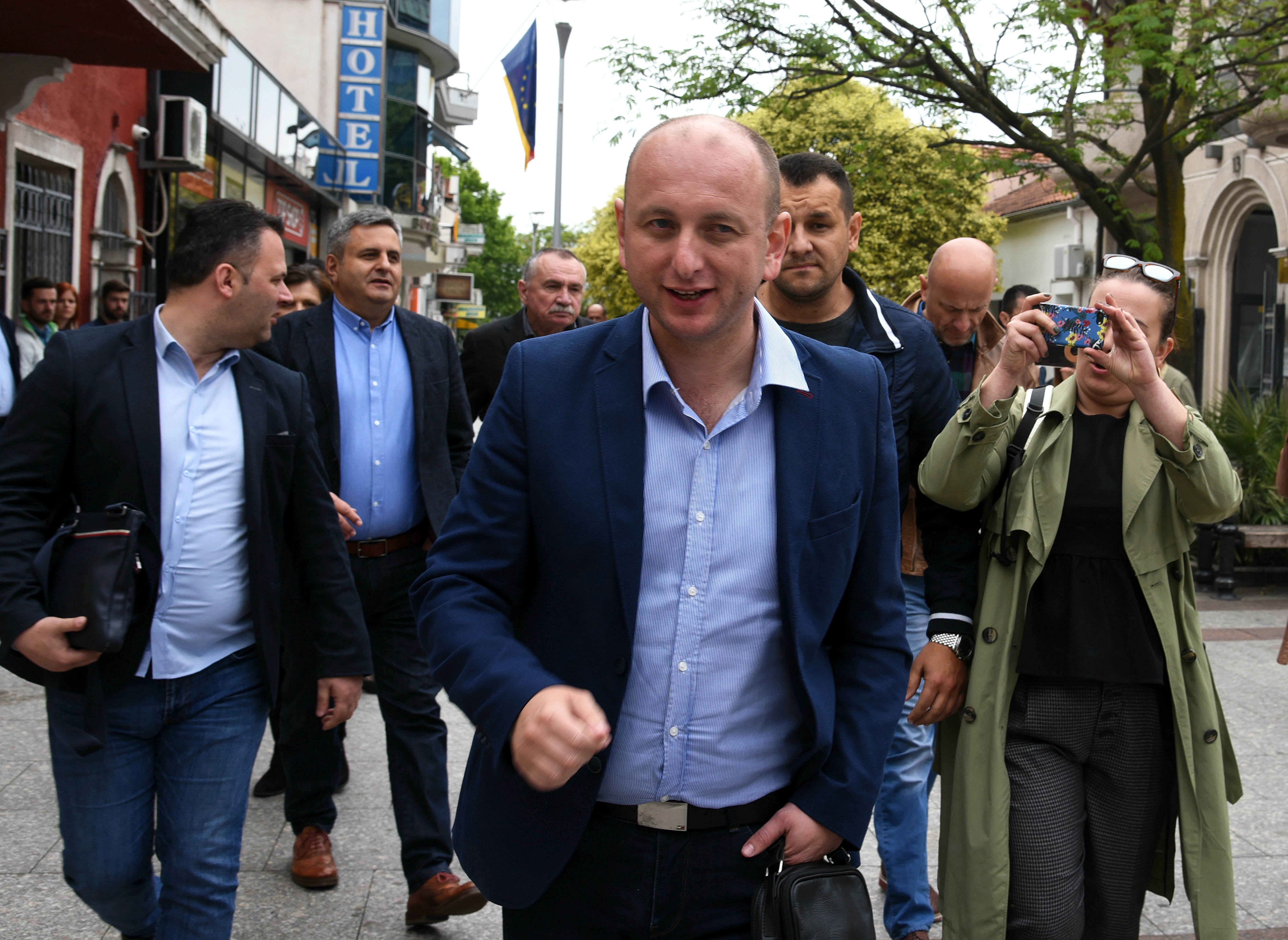 Two Russian intelligence officers and two opposition politicians were among 13 people sentenced