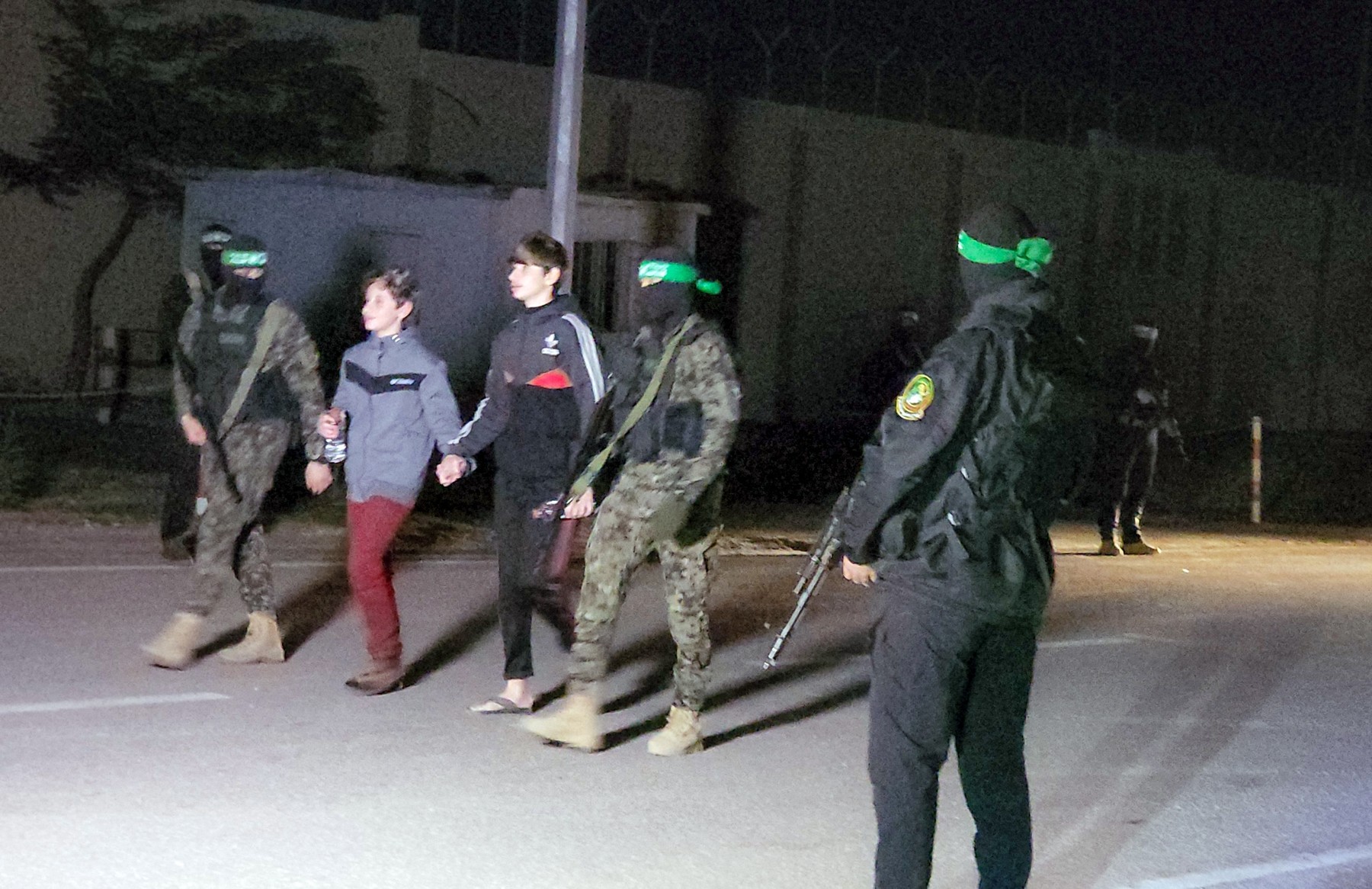 Hamas hands over 11 Israeli hostages to Red Cross officials