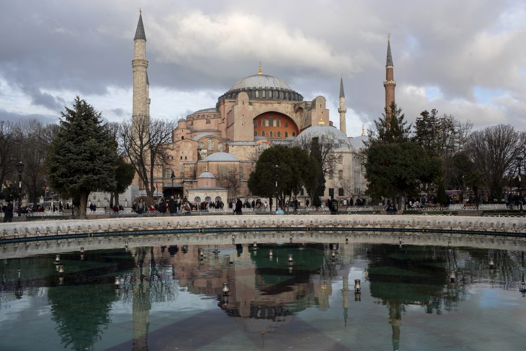 epa08100418 View of Hagia Sophia Museum reflected in a fountain's pool in Istanbul, Turkey, 03 January 2020.  EPA-EFE/SEDAT SUNA