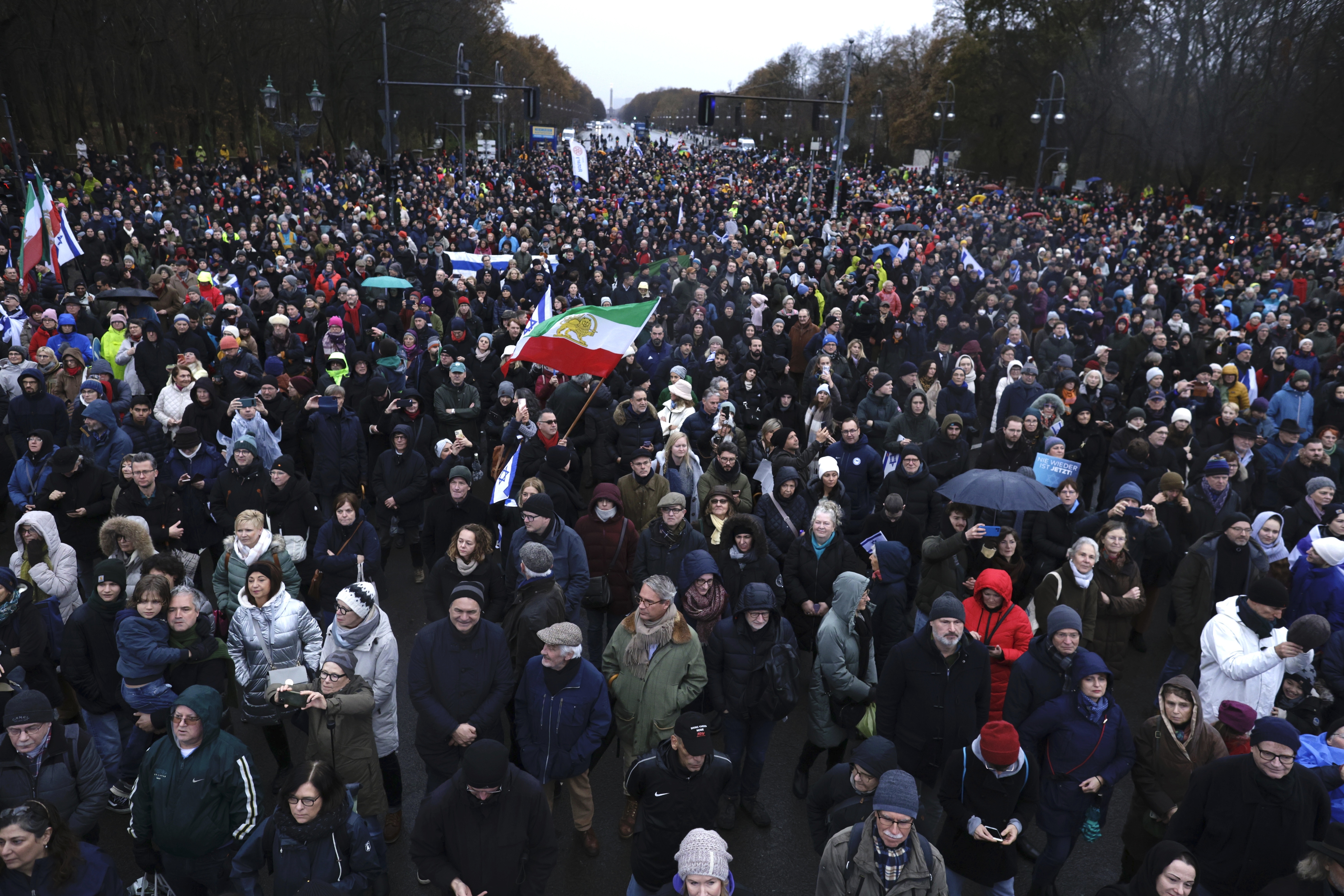 Participants in a demonstration protest against anti-Semitism under the slogan "Germany stands up - Never again is now!" in Berlin, Sunday, Dec. 10, 2023. (Carsten Koall/dpa via AP)