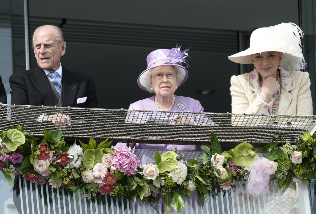 epa04243971 Britain's Prince Philip (L), Duke of Edinburgh, Queen Elizabeth II (C) and Princess Michael of Kent (R) attend the Epsom Derby at the Epsom Down Racecourse, in Epsom, outside London, Britain, 07 June 2014.  EPA/FACUNDO ARRIZABALAGA