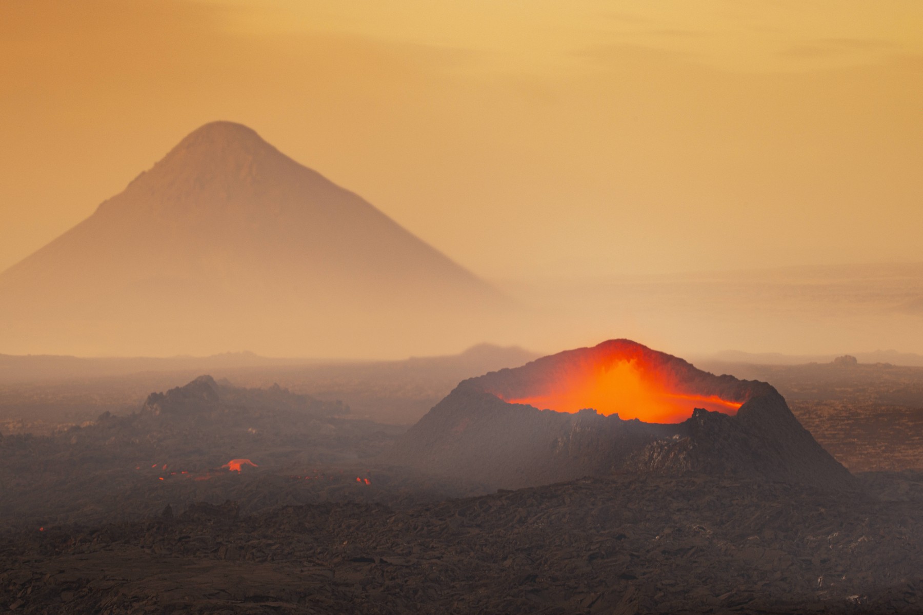 Creative Highlights World Long exposure to capture the sunset at Litli-Hrutur volcano during eruption, Reykjanes peninsu