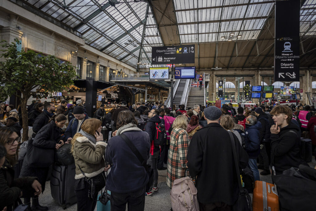 Eurostar passengers wait in the Gare du Nord concourse, Saturday, Dec. 30, 2023 in Paris, France, after high-speed services in the UK were cancelled because of flooding in a tunnel. (AP Photo/Aurelien Morissard)