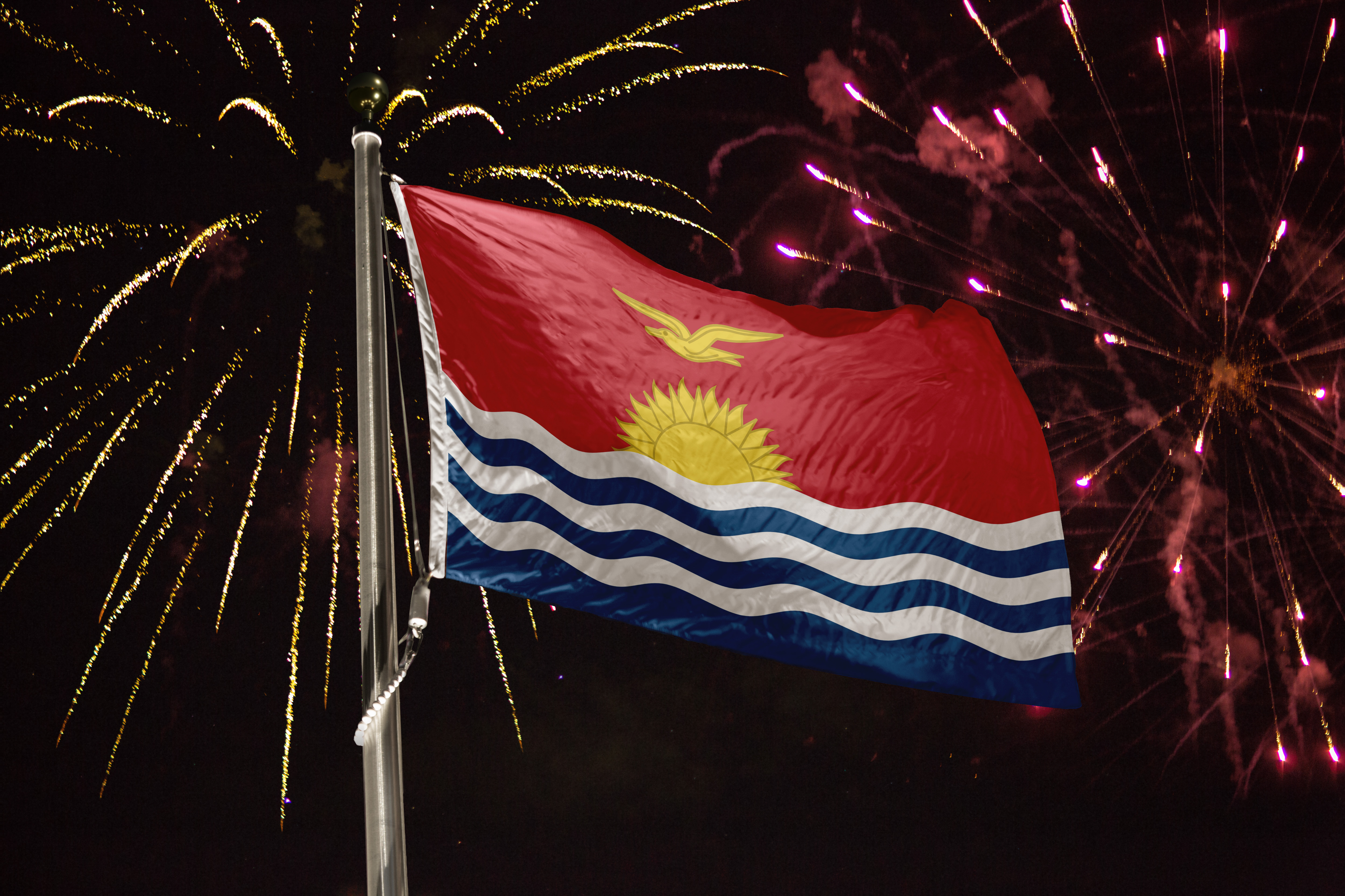 Kiribati,Flag,Blowing,In,The,Wind,At,Night