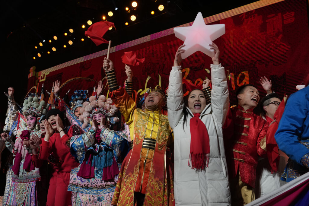 Performers ring in the new year after a countdown to 2024 in Beijing, Monday, Jan. 1, 2024. (AP Photo/Ng Han Guan)