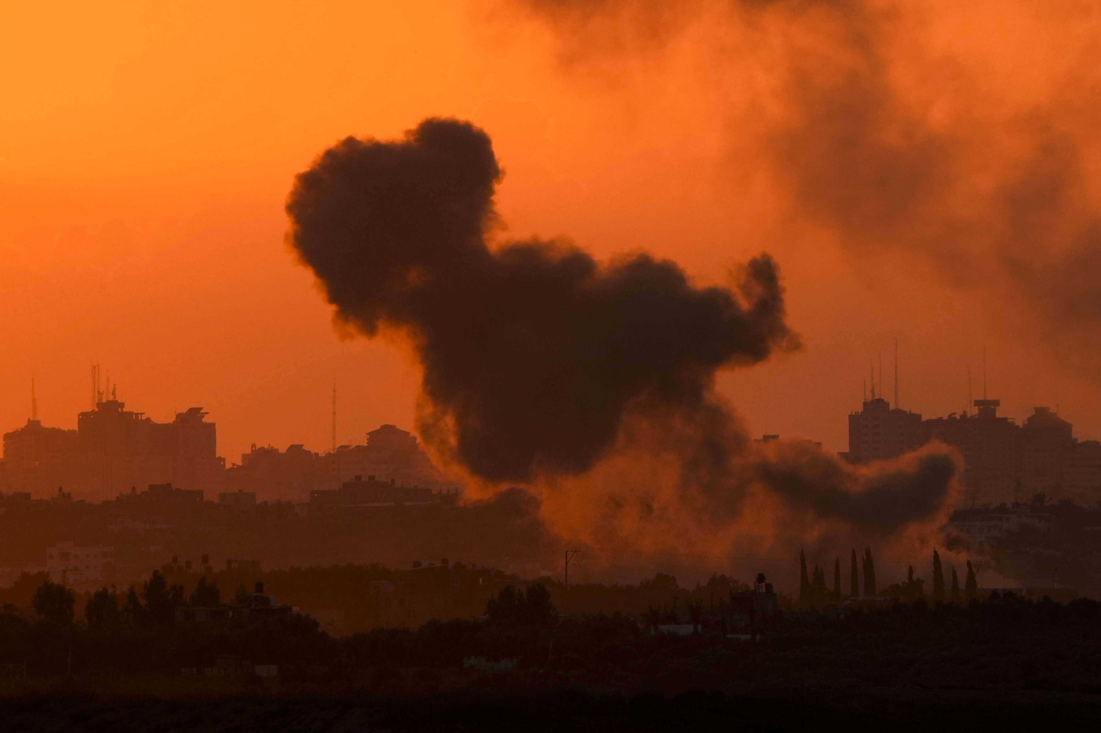 Smoke rises following an Israeli airstrike in the Gaza Strip, as seen from southern Israel, Wednesday, Oct. 18, 2023. (AP Photo/Francisco Seco)