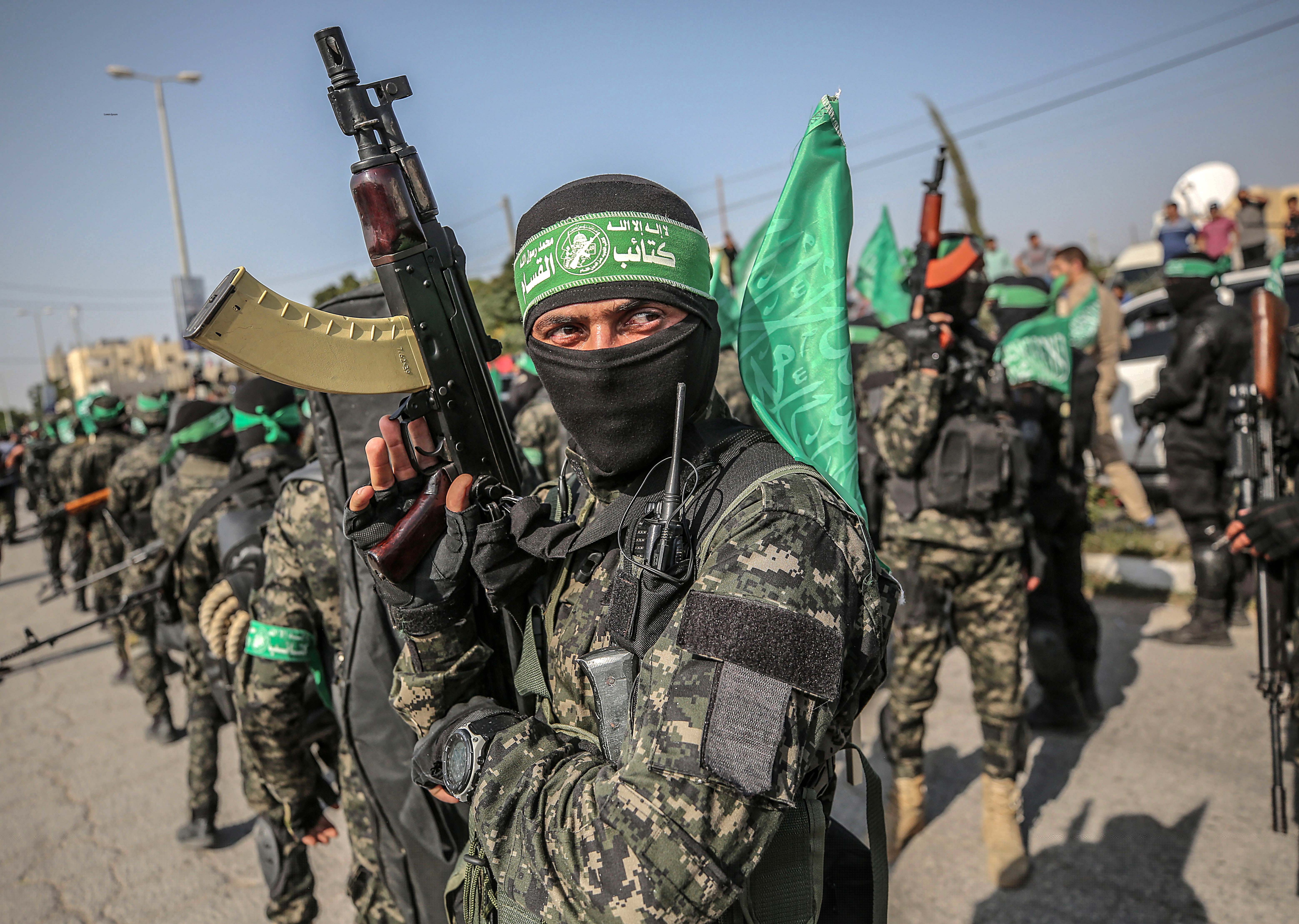 epa07988517 Fighters of Ezz al-Din al-Qassam brigades, the miliatry wing of Hamas movement march during a miltary parade in the east Khan Younis town, southern Gaza Strip, 11 November 2019.  EPA-EFE/MOHAMMED SABER