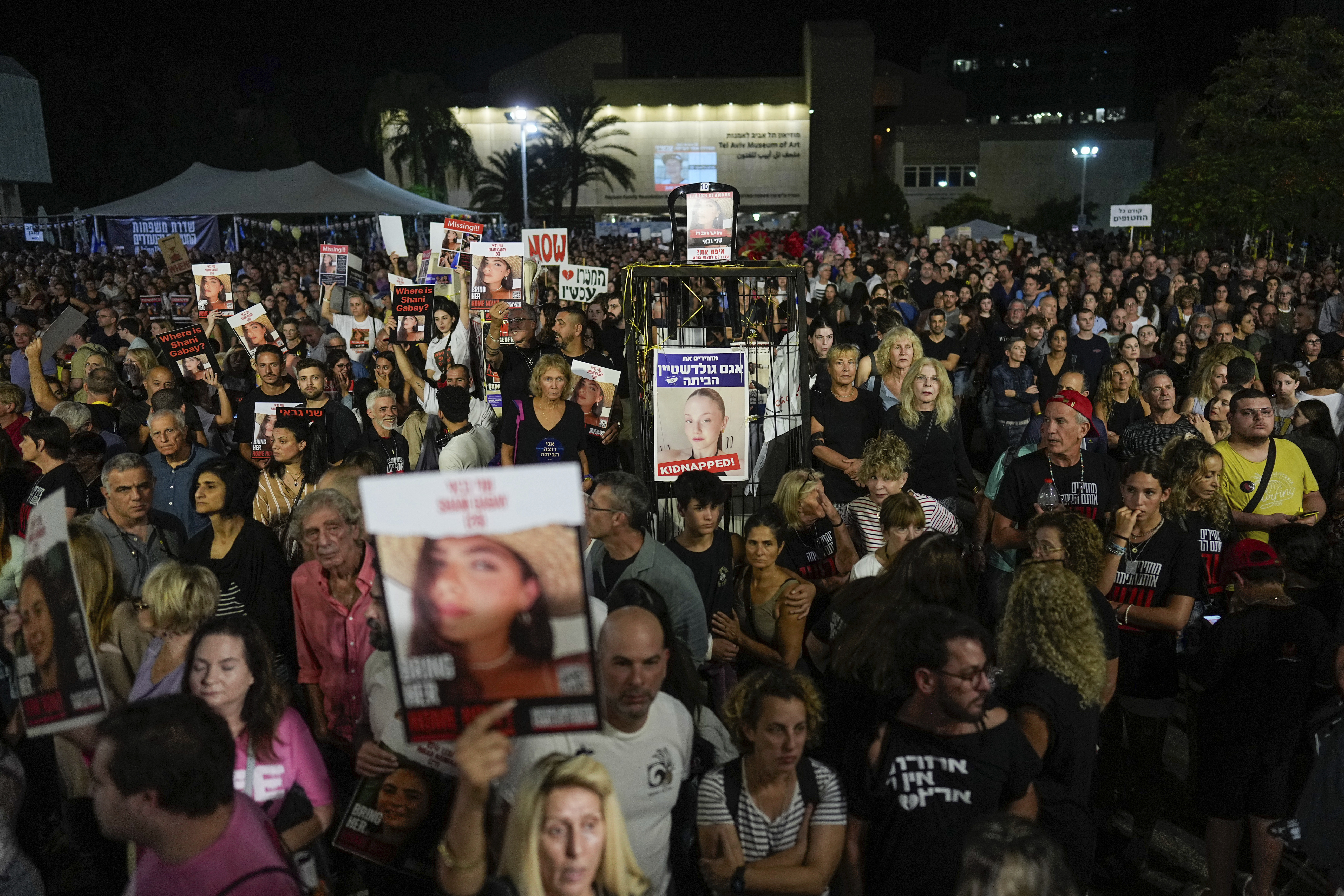 People attend a rally calling for the return of the hostages kidnapped during the Oct. 7 Hamas cross-border attack in Israel, in Tel Aviv, Israel, Saturday, Nov. 11, 2023. (AP Photo/Ohad Zwigenberg)