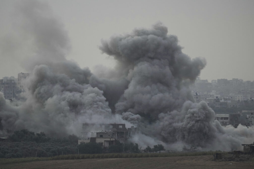 Smoke rises following an Israeli airstrike in the Gaza Strip, as seen from southern Israel, Sunday, Nov. 12, 2023. (AP Photo/Leo Correa)