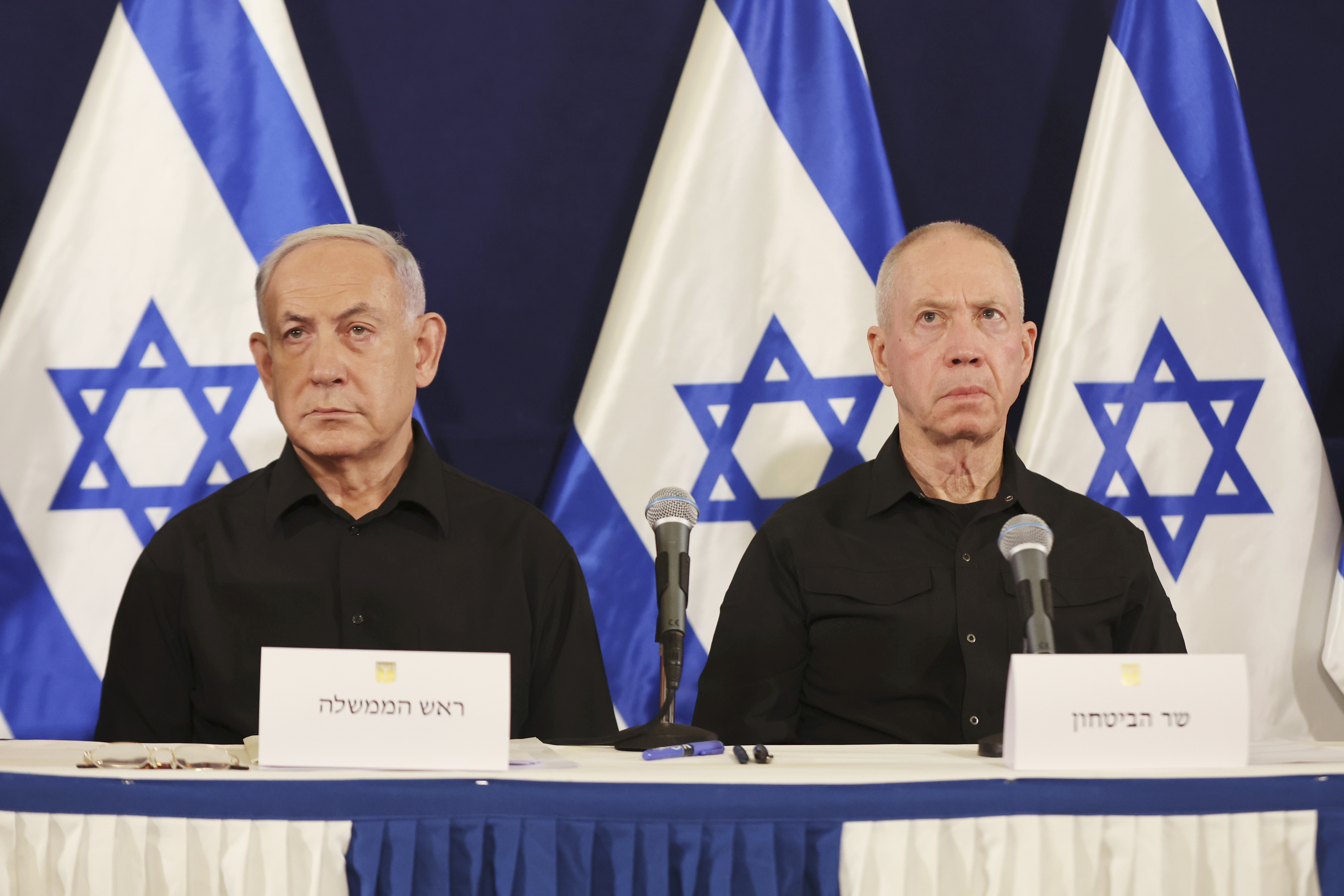 Israeli Prime Minister Benjamin Netanyahu and Defense Minister Yoav Galant during a press conference in the Kirya military base in Tel Aviv, Israel, Saturday, Oct. 28, 2023. (Abir Sultan/Pool Photo via AP)