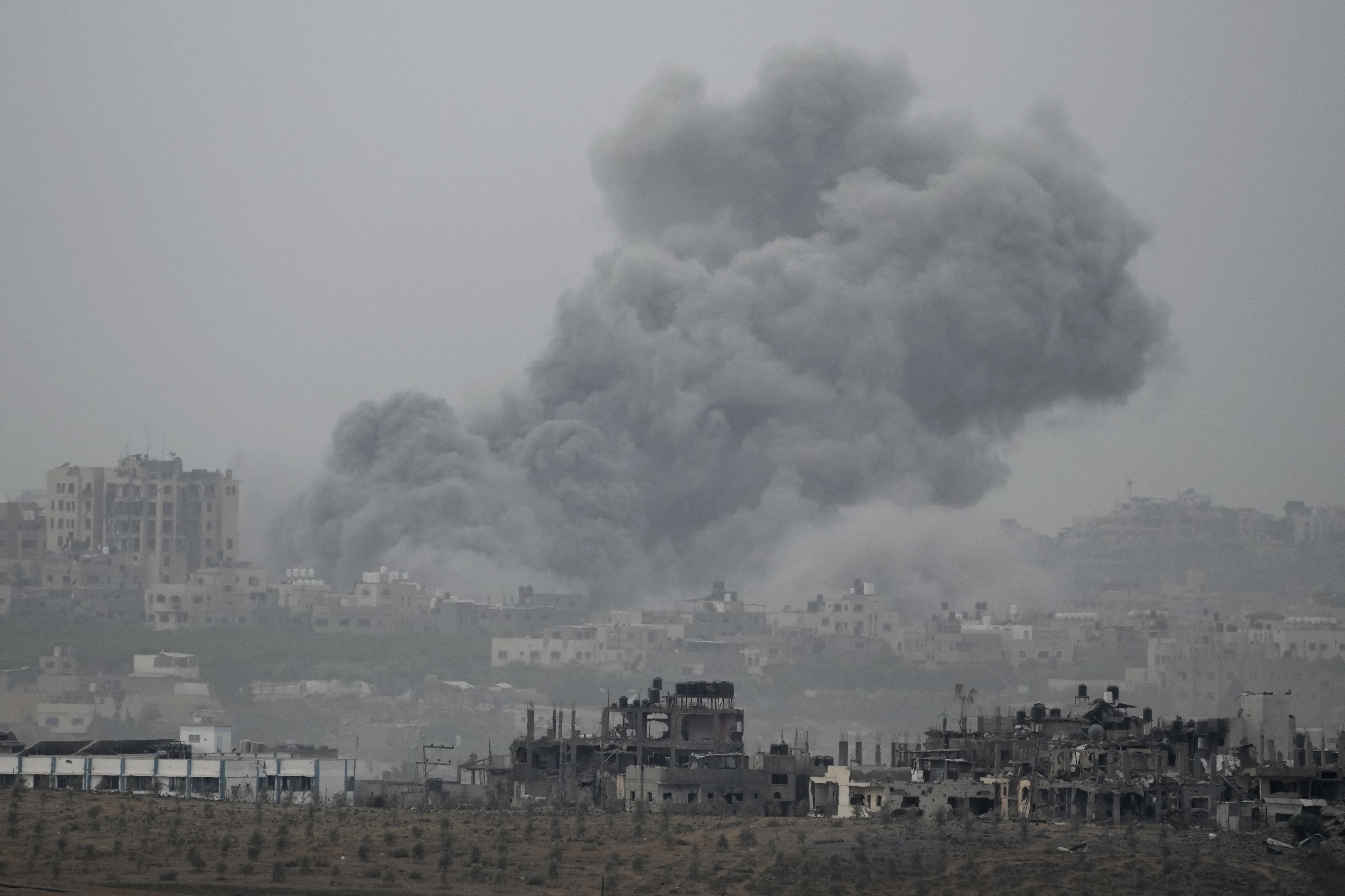 Smoke rises following an Israeli airstrike in the Gaza Strip, as seen from southern Israel, Sunday, Nov. 12, 2023. (AP Photo/Leo Correa)