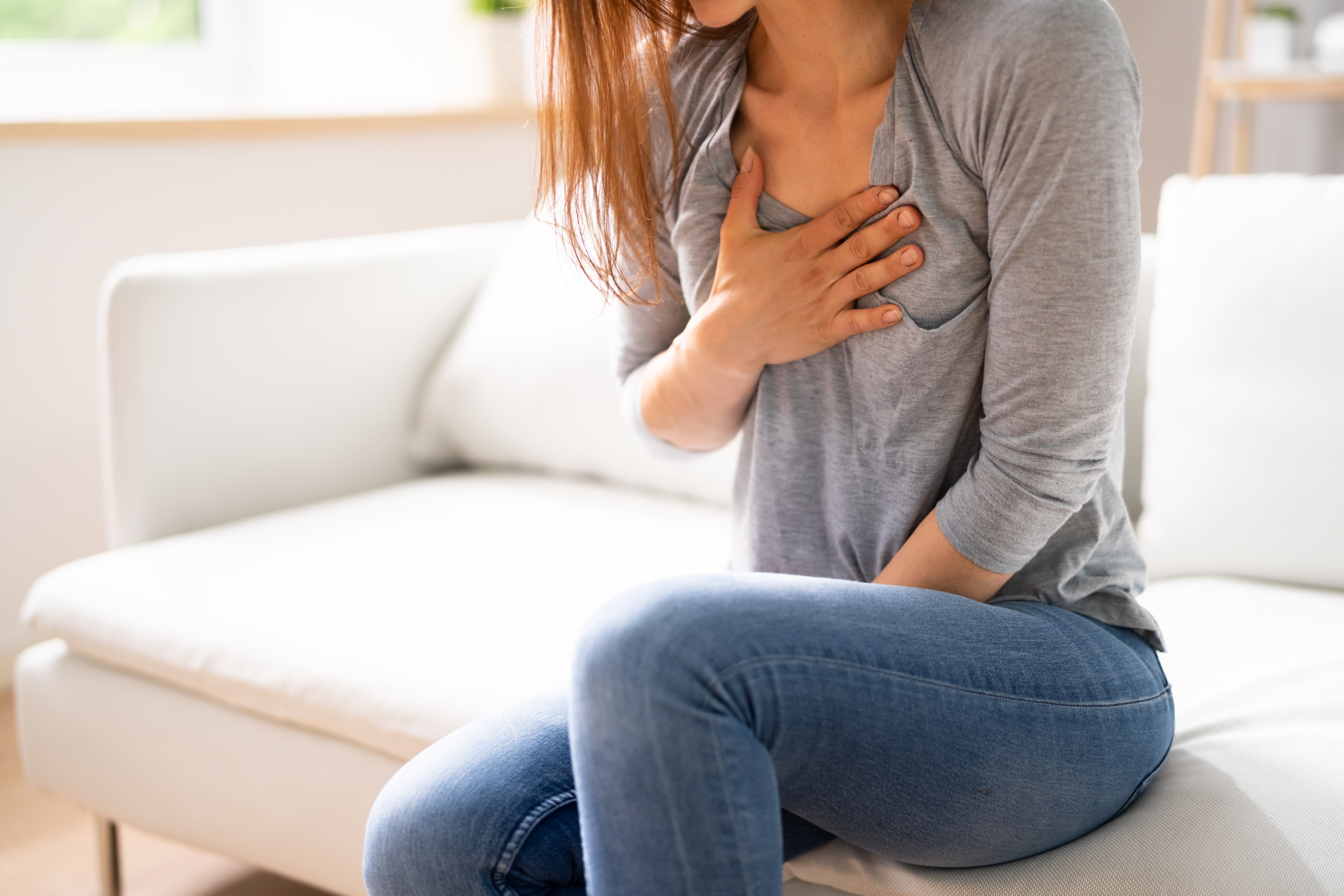 Portrait Of A Young  Woman Suffering From Chest Pain,Image: 703585033, License: Royalty-free, Restrictions: , Model Release: yes, Credit line: Andriy Popov / Panthermedia / Profimedia