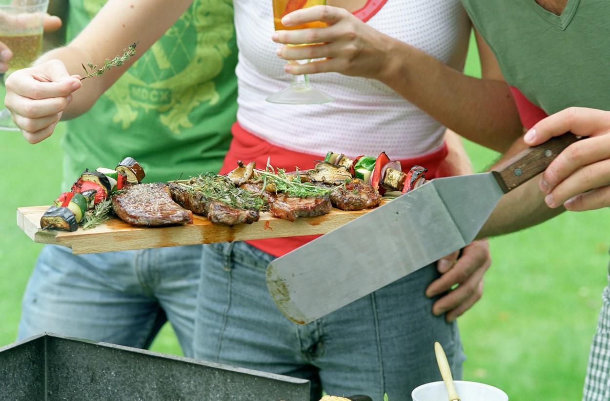 Young people having a barbeque