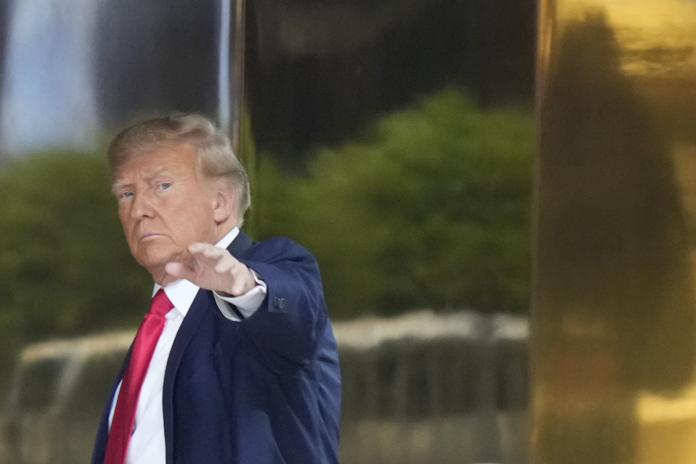 Former president Donald Trump arrives at Trump Tower in New York on Monday, April 3, 2023. Trump is expected to be booked and arraigned on Tuesday on charges arising from hush money payments during his 2016 campaign. (AP Photo/Bryan Woolston)