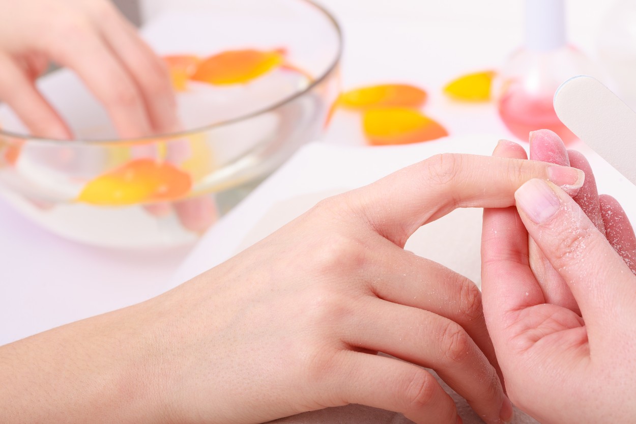 Beautician with file filing nails female client. Woman spa beauty salon,Image: 183626201, License: Royalty-free, Restrictions: , Model Release: yes, Credit line: Krzysztof Zabłocki / Panthermedia / Profimedia