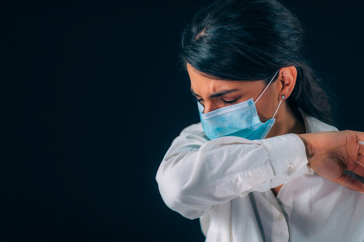 Covid-19 coronavirus prevention. Young woman coughing in her elbow or sleeve.,Image: 541172372, License: Royalty-free, Restrictions: Model Released
31630, Model Release: yes, Credit line: Science Photo Library / Sciencephoto / Profimedia