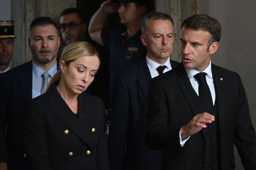 France's President Emmanuel Macron arrives with Italy's Prime Minister, Giorgia Meloni prior a meeting at the Palazzo Chigi in Rome, Tuesday, Sept. 26, 2023. (Filippo Monteforte, Pool via AP)