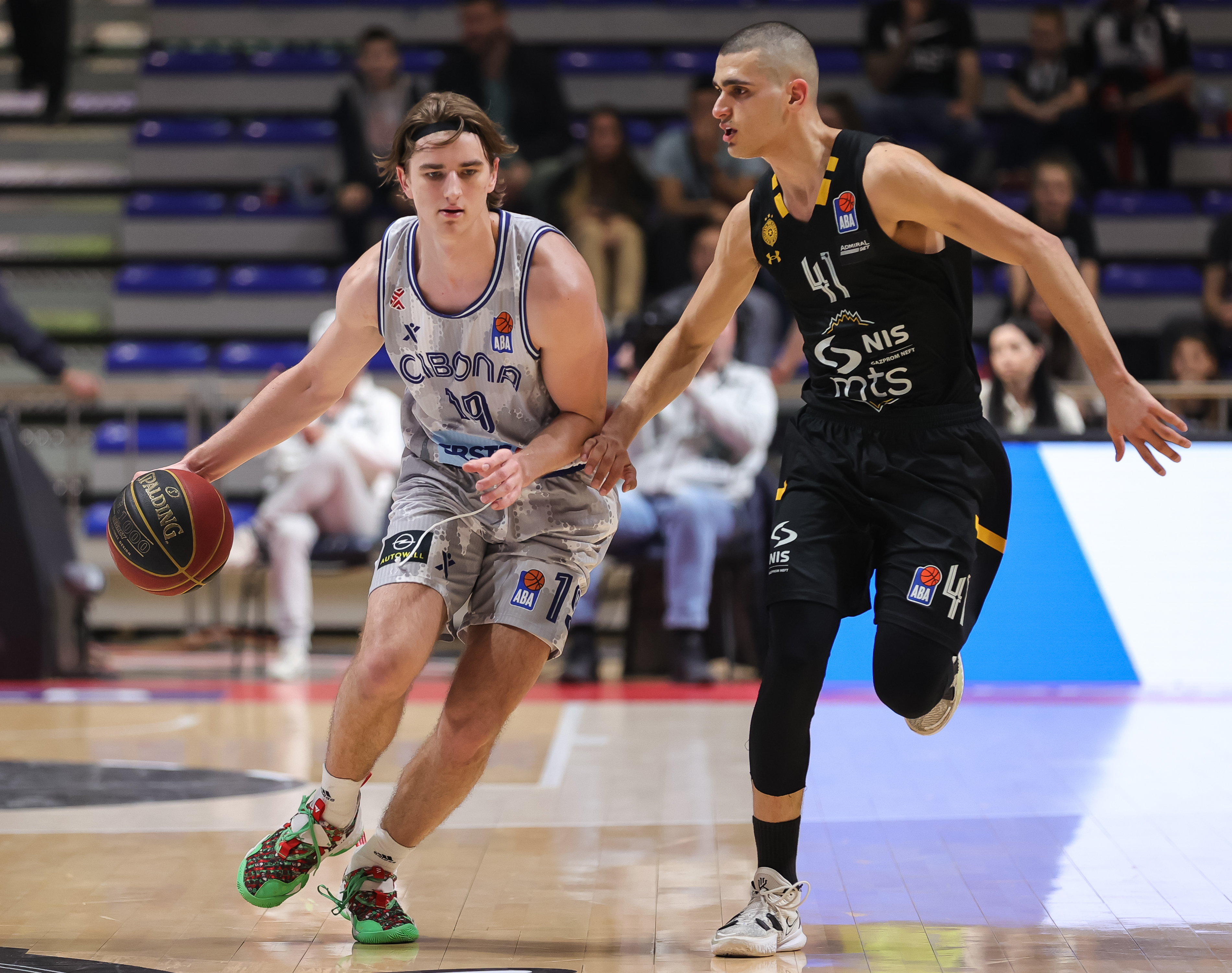Lovro gnjidic (L) and Yam Madar
Partizan v Cibona-Aba League Season 2021-2022
Beograd, 15.04.2022.
foto: Srdjan Stevanovic/Starsport.rs ©