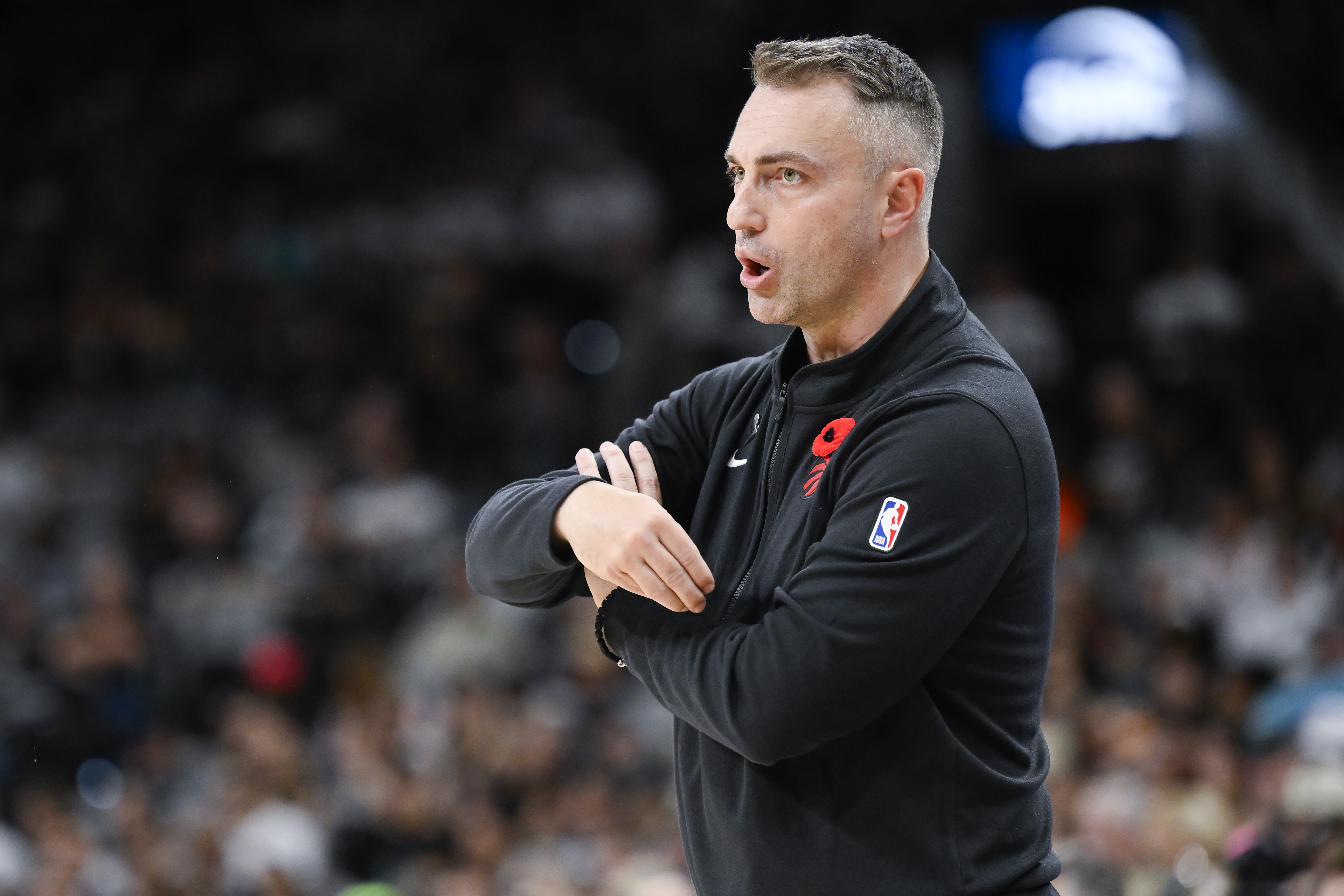 Toronto Raptors head coach Darko Rajakovic watches his team during the second half of an NBA basketball game against the San Antonio Spurs, Sunday, Nov. 5, 2023, in San Antonio. (AP Photo/Darren Abate)