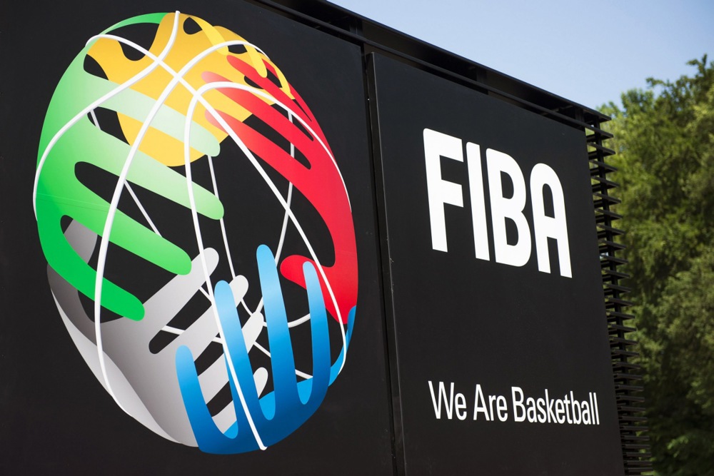 epa03750434 The FIBA logo is seen during the inauguration of the new headquarters of the International Basketball Federation FIBA in Mies, Switzerland, 18 June 2013.  EPA/JEAN-CHRISTOPHE BOTT