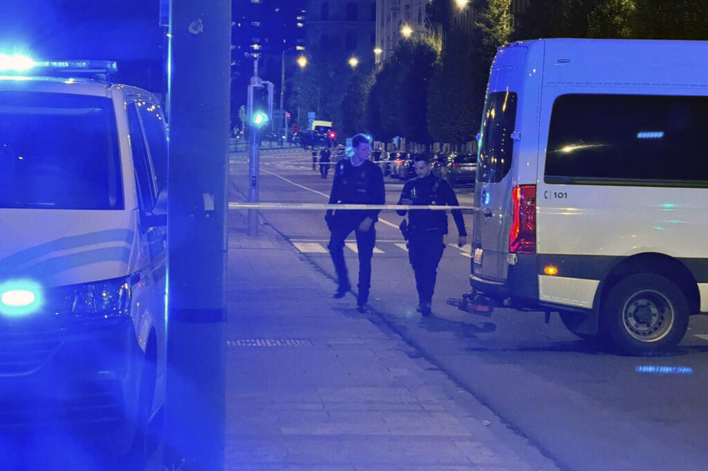 Police cordon off an area where a shooting took place in the center of Brussels, Monday, Oct. 16, 2023. Belgian police say that two people are dead in central Brussels after several shots were fired. (AP Photo/Sylvain Plazy)