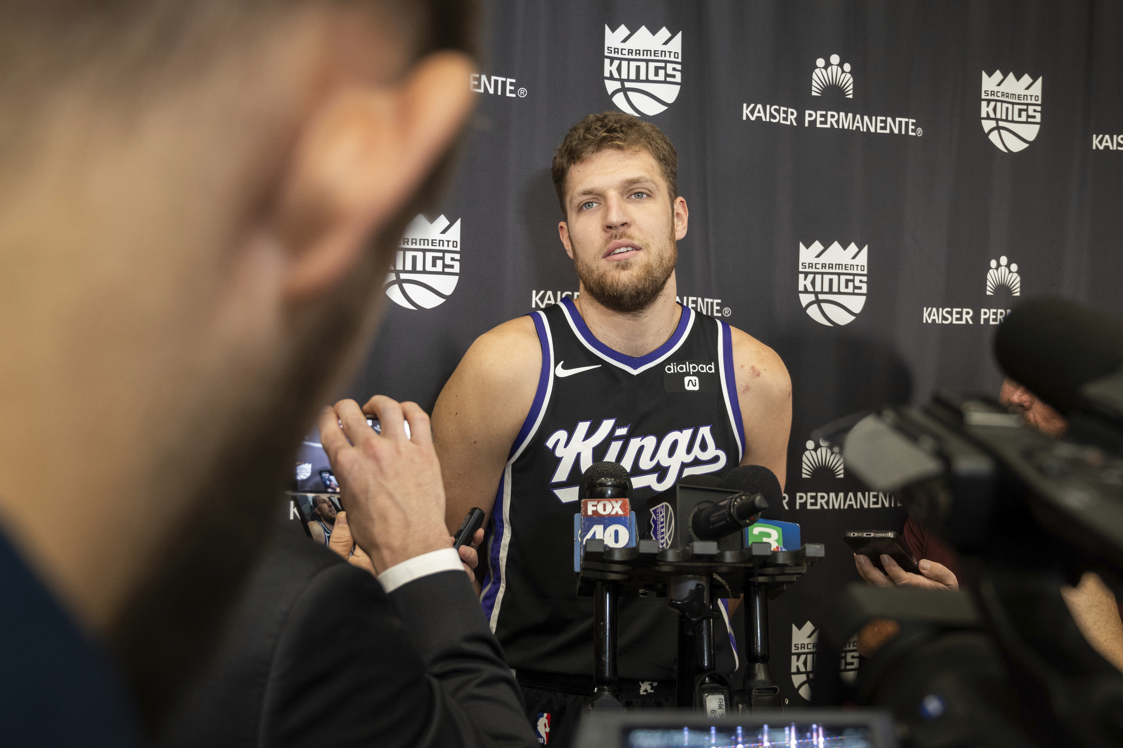 Sacramento Kings' Sasha Vezenkow answers questions during the NBA basketball team's media day in Sacramento, Calif., Monday, Oct. 2, 2023. (AP Photo/José Luis Villegas)