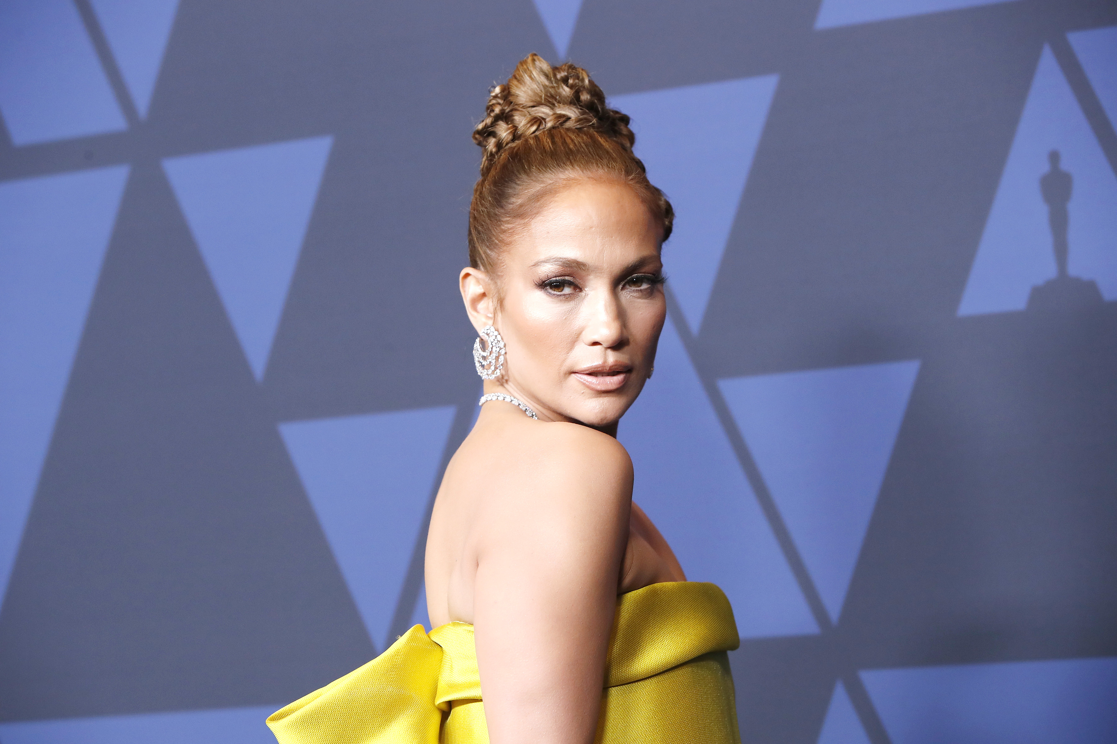 epa07955559 US actress Jennifer Lopez poses on the red carpet prior to the 11th Annual Governors Awards at the Dolby Theater in Hollywood, California, USA, 27 October 2019.  EPA-EFE/NINA PROMMER